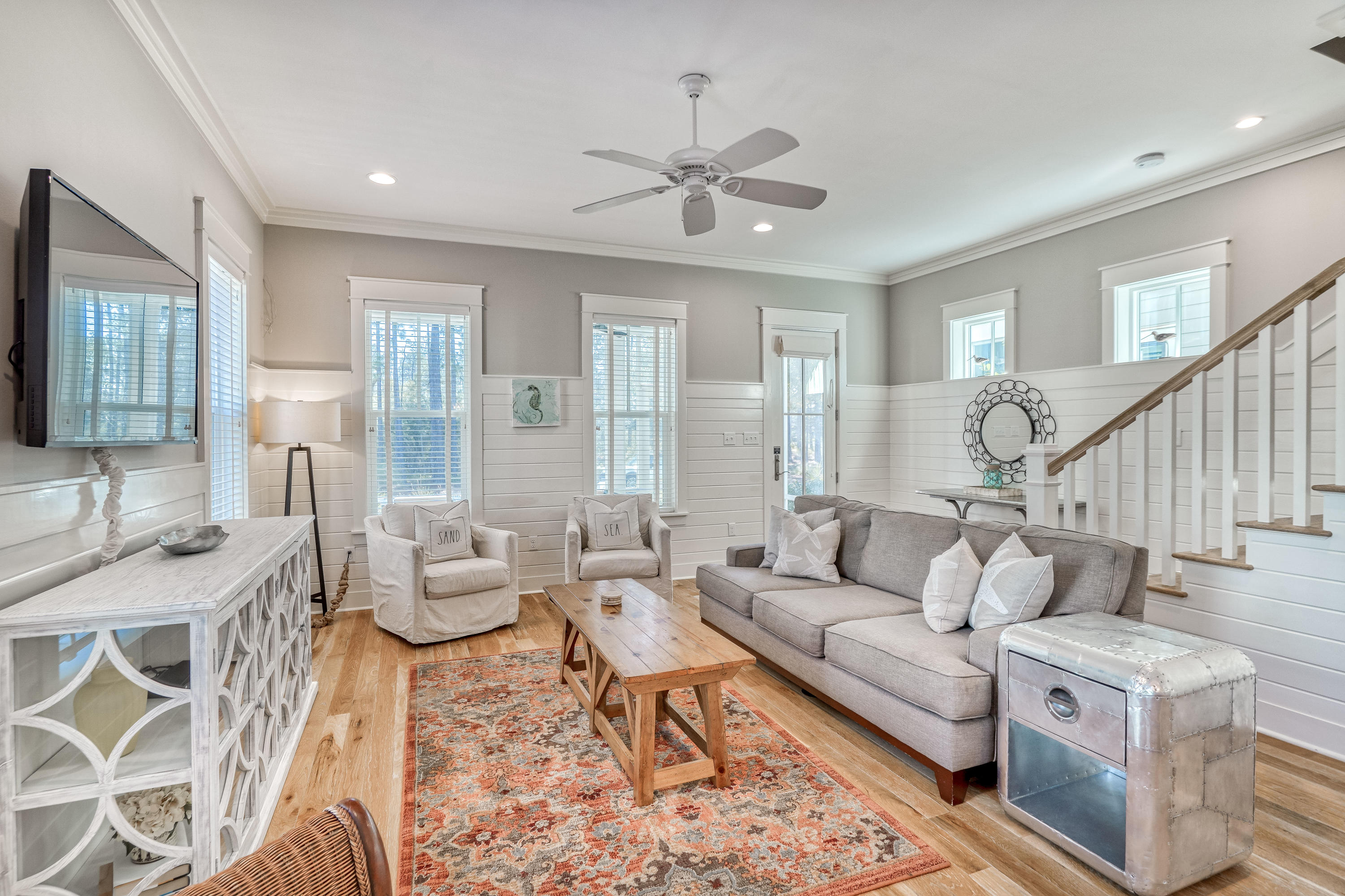 This Watercolor cottage is everything you've been looking for! Built by Huff Homes in 2014, this 5 bedroom, 4.5 bath home has everything you need for a primary or vacation home, fully furnished (including a golf cart), this home features; wire brushed oak hardwood floors throughout, V-Groove wood walls, wine cooler, 10' ceilings, an open concept living area, and a spacious screened in porch. The first floor is completed by one of two master suites. Upstairs you will find a second living area with vaulted ceilings, the primary master suite overlooking WaterColors lush natural vegetation, two guest bedrooms; one with its own ensuite bath, and an oversized bunkroom, perfect for a kids. Rentals: 2019 $42,663 & 2020 (due to Covid) $38,023.