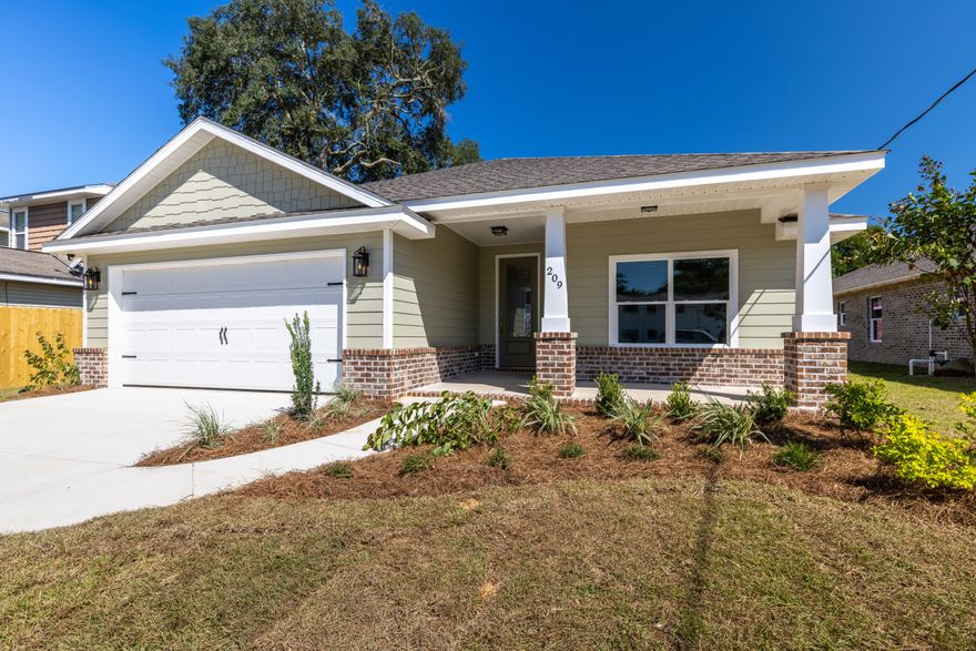 Another astounding home built by Southern Paradise Homes. This 4 bedroom and 3 bath is beautifully built in the heart of Shalimar FL. Open floor plan has spacious kitchen area to enjoy many friends and family members. LVP flooring through out. Kitchen has custom white shaker cabinets with easy close doors and drawers, tile kitchen backsplash, granite countertops in kitchen and bath, stainless steel appliances including refrigerator. Master bedroom feature tray ceilings. Large master bath with double vanity, frameless glass shower and free standing tub. Large back porch. Home includes sprinkler system and privacy fence with gate. **All measurements and verified by buyer**