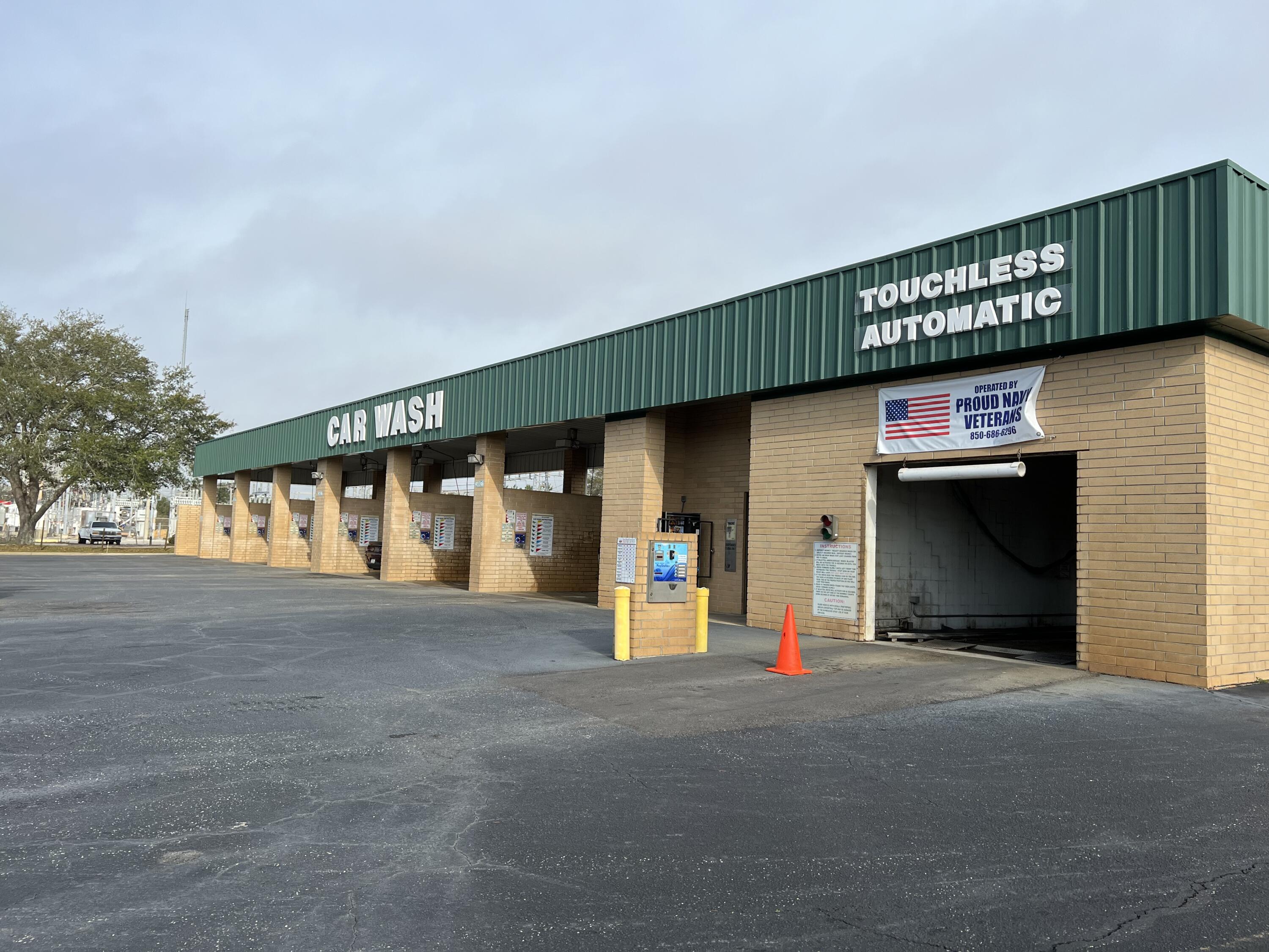 Income producing; Car Wash in growing Navarre with over 3538 sq ft of commercial business! Building Features: Canopy 102; Office Type 595 and Unfinished Open porch, 357 sq feet; Located on Hwy 98 in highly visible area, this car wash has a cash flow and is highly sought after for business; 8 car wash units and two that measure 17 x 41 and 18 x 41; the others measure 17 x 21 and one that is a Touchless Automatic stall that measures 18 x 21; Comes with Coin machines, 8 vacuum's for easy clean up; Also includes one vending machine; Building does include an office area that is used for storage space currently; Check out this great business opportunity today;