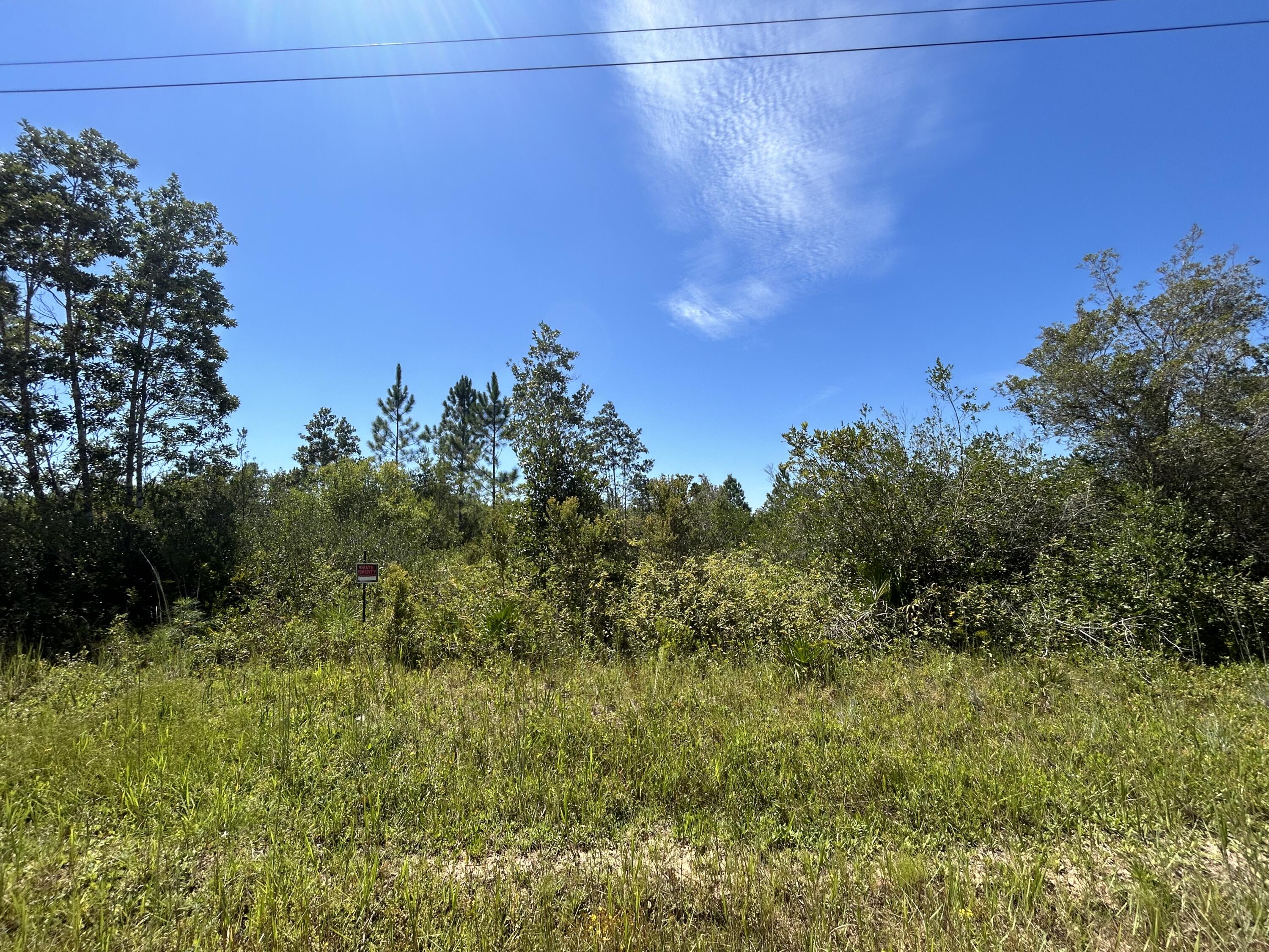 This 20-acre property in Fountain, Florida offers endless potential in a peaceful rural setting while keeping you within miles to the coast and city conveniences. Located just 27 miles from Panama City, 32 miles to Northwest Florida Beaches International Airport (ECP), 37 miles to Panama City Beach, and 34 miles to Mexico Beach, it's perfectly positioned for a private retreat, custom home, farm, or future development. With mature trees, open spaces, and easy highway access, this land provides a rare opportunity to enjoy country living while staying connected to shopping, dining, and the Gulf Coast lifestyle.