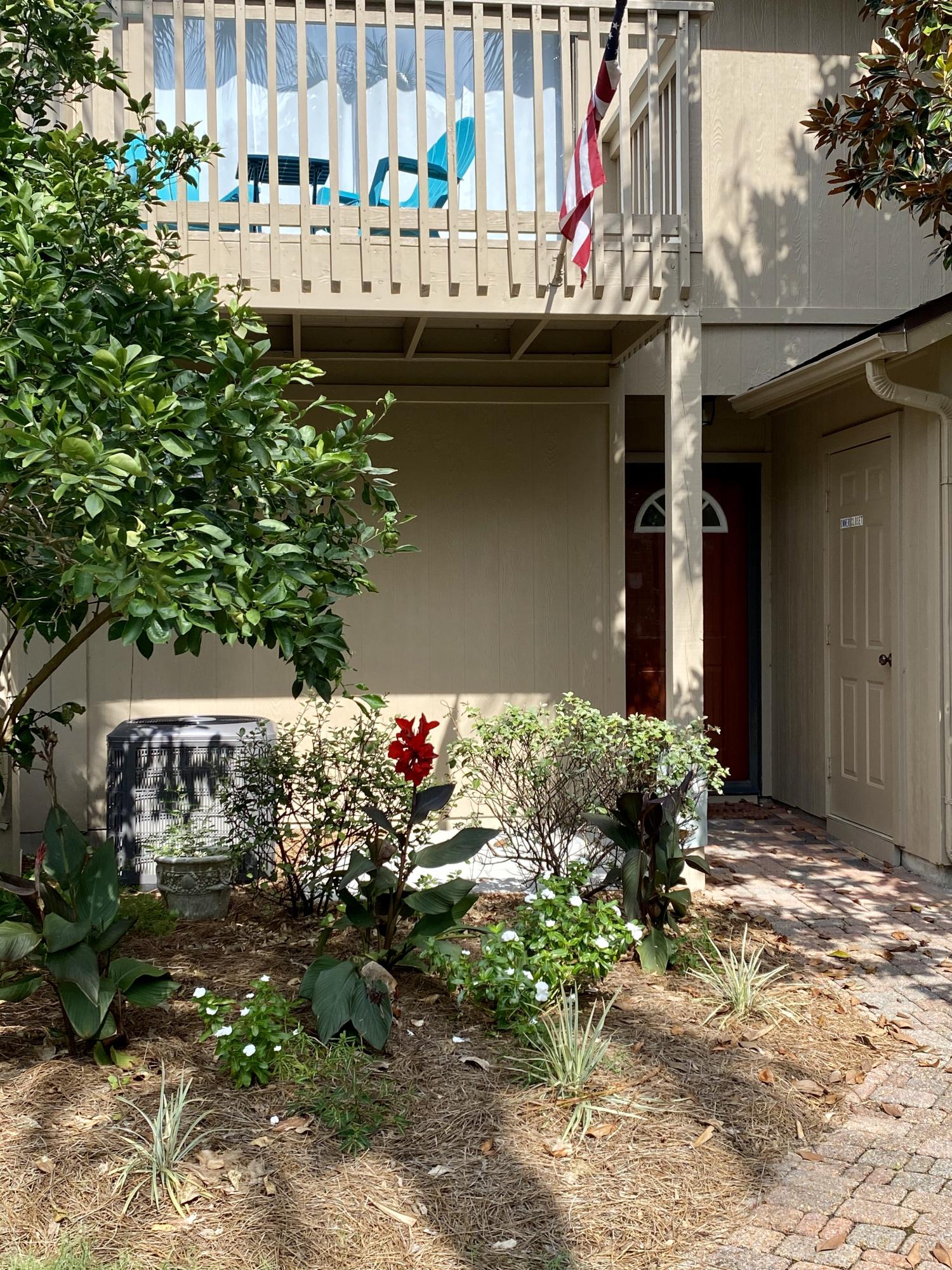 This affordable townhouse is the perfect getaway! Where else can you be this close to the beach, biking & walking trails, restaurants and shopping? Tastefully decorated with vinyl plank flooring, beach decor, a beautiful master bedroom, cute bunks in 2nd bedroom. 3 porches, plenty of storage and overlooks the tennis courts. Sold fully furnished with some exceptions. (See list) Bring your rackets & bikes and make this yours! More pictures coming soon!