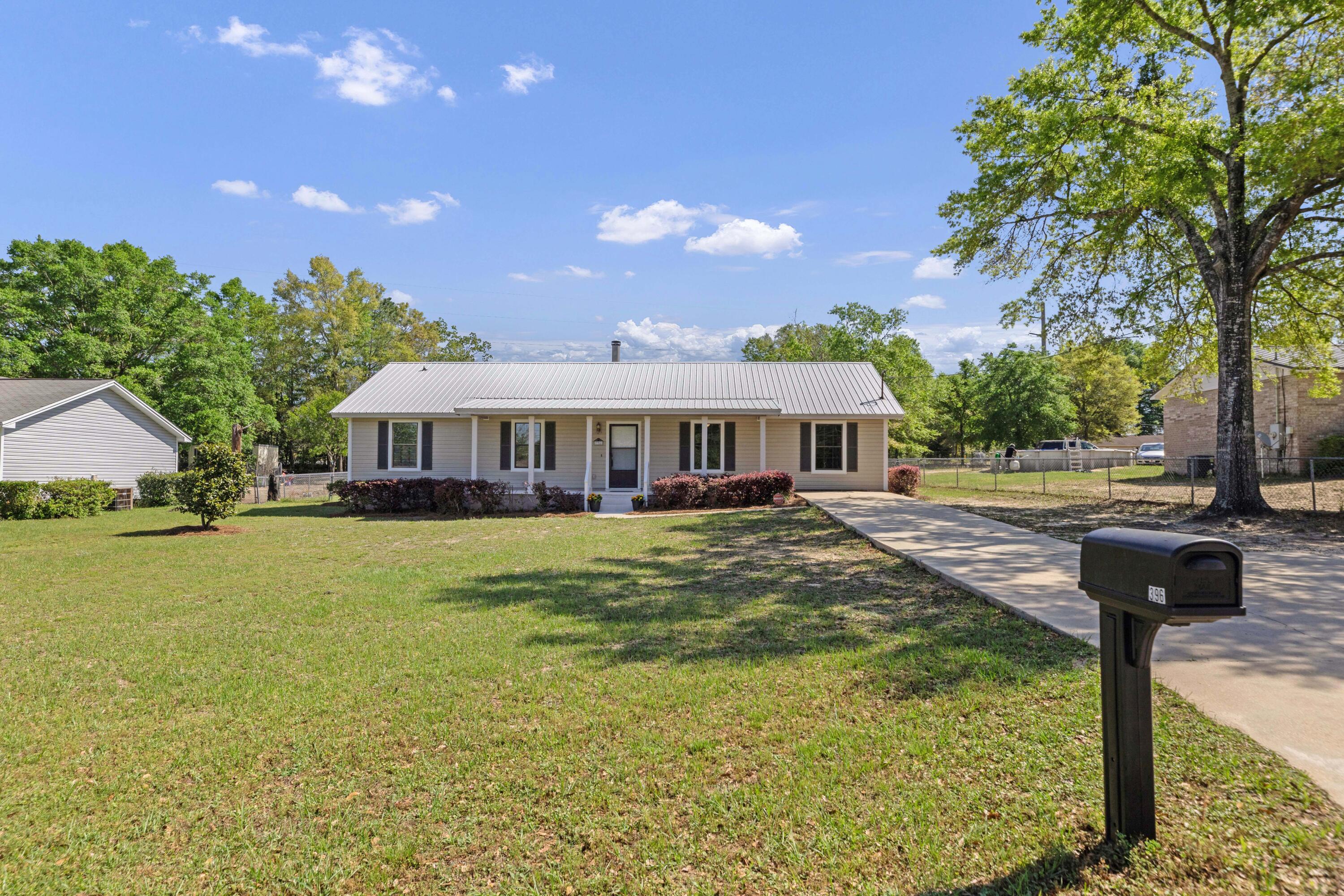 Charming 3-Bedroom Home on Lakeview Drive - DeFuniak Springs, FLNestled in the heart of DeFuniak Springs, this delightful 3-bedroom, 2-bathroom home sits on just over a third of an acre in a peaceful setting on Lakeview Drive. Featuring a split bedroom floor plan, this home offers privacy and functionality for families or guests.The spacious living area is warm and inviting, with plenty of natural light. The kitchen is well-equipped with ample cabinet and counter space, perfect for preparing meals with ease. The primary suite includes its own private bath, while the additional bedrooms are comfortable and versatile.The home features fresh paint and flooring throughout, new countertops and new stainless steel appliances in the kitchen. Roof was replaced in 2017.