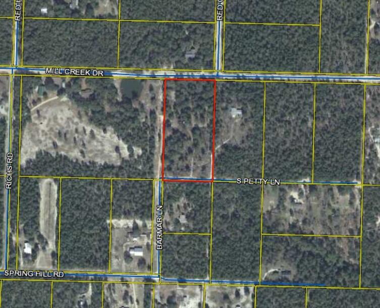 Nicely Treed 5 acre parcel. Water and Power access on the west side of the property line. Tap fee has been paid.