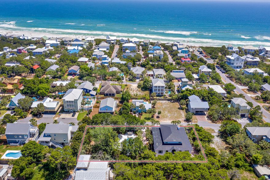 This is a one of a kind luxury vacation property on the West end of 30A with endless opportunities. Gross rentals over $150k in 2019. The large home is positioned on a three lot parcel of land. This 8 bedroom, 8 bath home, features 2 massive open living areas, allowing plenty of space for entertaining large groups. The home can sleep up to 29 people. Relax in the natural setting while enjoying the enormous outdoor living areas on one of two screen porches. The large saltwater pool and outdoor cooking area with wet bar will make it tough to leave. The home is just steps from the beautiful Gulfview Heights beach access. AND the top floor has views of the water!Gulf Place is a bike ride away and offers restaurants, shopping, wine, art and music festivals throughout the year.