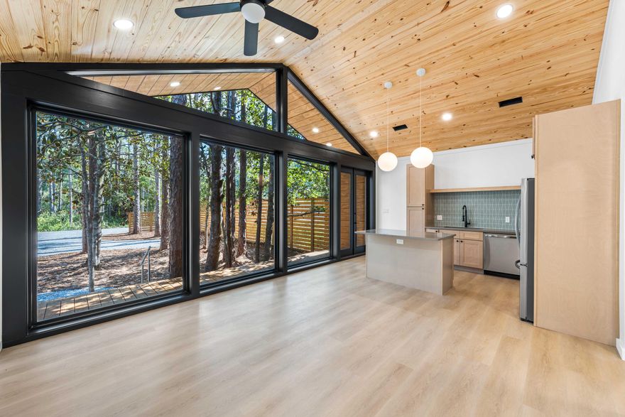 Introducing a New Standard of Living in Santa Rosa Beach, FL This newly completed residence offers a fresh take on modern living, blending clean architectural lines, natural textures, and abundant natural light. Designed with simplicity and function in mind, the home features a bright open-concept layout, vaulted ceilings with wood tongue and groove detail, and expansive Anderson windows that create a seamless connection between indoor and outdoor spaces.Inside, you'll find durable luxury vinyl plank flooring and matching stainless steel appliances that bring both style and practicality to the heart of the home. The primary suite includes a full ensuite bathroom and a spacious walk-in closet, offering a quiet and private retreat. A second bedroom and full guest bath provide flexibility for guests, family, or a home office setup. Step outside to enjoy the fenced yard with natural landscaping, along with a spacious outdoor deck, ideal for entertaining or unwinding in the fresh air. Move-in ready and thoughtfully designed, this modern home offers the perfect balance of comfort and clean, coastal style in the sought-after Santa Rosa Beach community. Located just 10 minutes from the beach and the shops and dining of Gulf Place on 30A, and only 3 minutes from the Cessna Landing boat launch on Hogtown Bayou, you'll enjoy convenient access to both water and lifestyle amenities that make this area so desirable.

