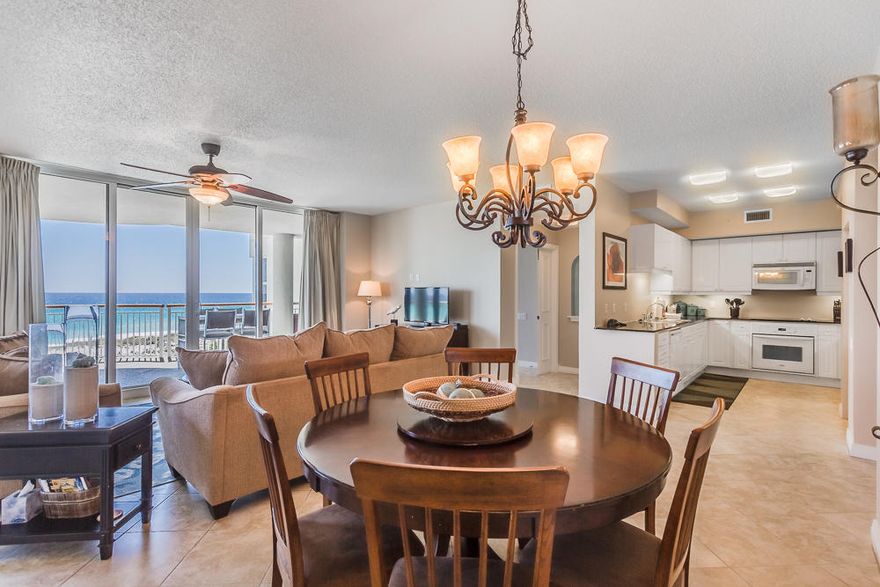 Spectacular views of the famous emerald waters of the Gulf of Mexico. A very impressive large balcony can be accessed through glass pane sliding doors of the living area and the master bedroom. A superb 3 bedroom, 3 full bathroom, beach front unit with plenty of room for everyone, making it a terrific high-end rental opportunity. Enjoy memorable sunrises and sunsets at your leisure or fall asleep to the sounds of nearby waves. Additional features include an elegant all-white kitchen with black granite counter tops and a spacious living room with a new sofas designed for comfortable lounging. Walk in closets, a master bedroom suite with a corner jet tub overlooking the beach, and a split floor