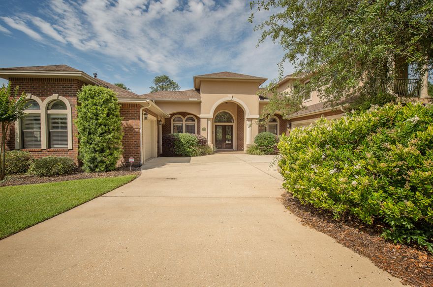 Exquisite 4 Bedroom, 3 Bath home, South of I-10, with study/office, sun room and a heated/enclosed pool, on .8 acres located in the highly desired neighborhood of Juniper Creek Estates. Fantastic floor plan with 12 foot trey ceilings, hardwood floors and travertine in the living and dining areas, tile floors in the kitchen/bathrooms and carpeted bedrooms. Incredible kitchen accented with pendant and recessed lights, granite counter tops, island and stainless appliances. The huge master suite has his and her walk in closets, dressing area, double vanities, king sized travertine shower and garden tub. The extended custom lanai with enclosed pool. This is a MUST SEE