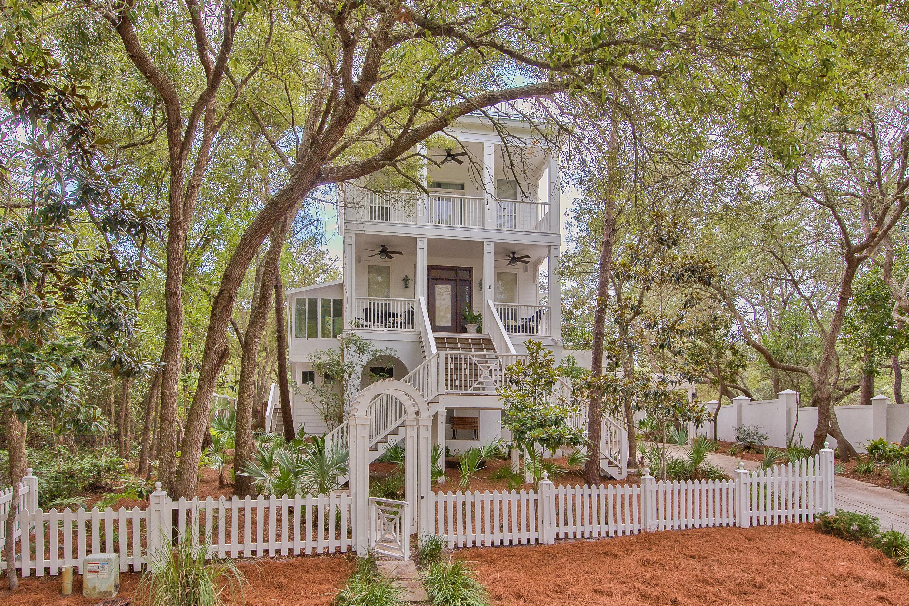This southern coastal charm home is truly one of a kind, offering an idyllic opportunity for a primary home, second home, or investment. With 2,370+ sq. ft. just one lot off Camp Creek Lake, the home's high elevation creates stunning, expansive views from the lake all the way to the Gulf of Mexico. Year-round sunsets can be viewed from the rooftop of this charming home on Cove Creek Lane. The home is prominently located within biking distance to Watersound Beach, The Hub, Alys Beach, Seacrest Beach, and Rosemary Beach.