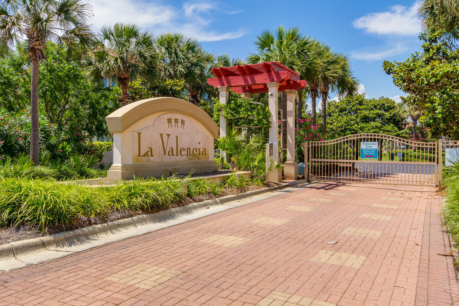 First tier gulf view villa in La Valencia. ''Sugar beach'' has a luxurious coastal feel featuring two master suites with private balconies. Two additional bedrooms and full size bunk area to accommodate you beach lovers. To add to the ambience noted features include a gas fireplace and Brazilian wood flooring. Easy walkover to the gulf front clubhouse and pool with deeded beach access. Private owners clubhouse and pool is easily accessible as well. Located on the west end of our beautiful Panama City Beaches. Close proximity to Carillon Beach, Rosemary Beach and Pier Park.Conveys fully furnished rental ready. Excellent investment opportunity with impressive rental history. Ideal for your primary residence as well.