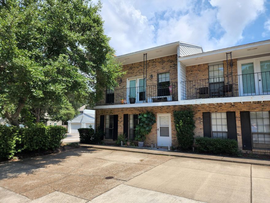 Attention investors and future homeowners! Great opportunity to own an end-unit 3 bedroom townhome, part of a quaint established TH development in Cinco Bayou; convenient to shopping, restaurants, and elementary school - and only minutes to the Gulf beaches. Almost 1,600 sf, tucked away on a quiet street just off Yacht Club Dr. Great floorplan with interior laundry room and fireplace. Brick and hardi-plank type siding, and exterior storage room in the small fenced rear yard area. Cozy balcony off master bedroom (with durable composite decking) overlooking Opp Blvd.  Shaded common area with picnic table.  Needs updating - Ready for your remodeling touches!  New AC in 2017, but will likely need a new roof. (Affordable roof quote available)