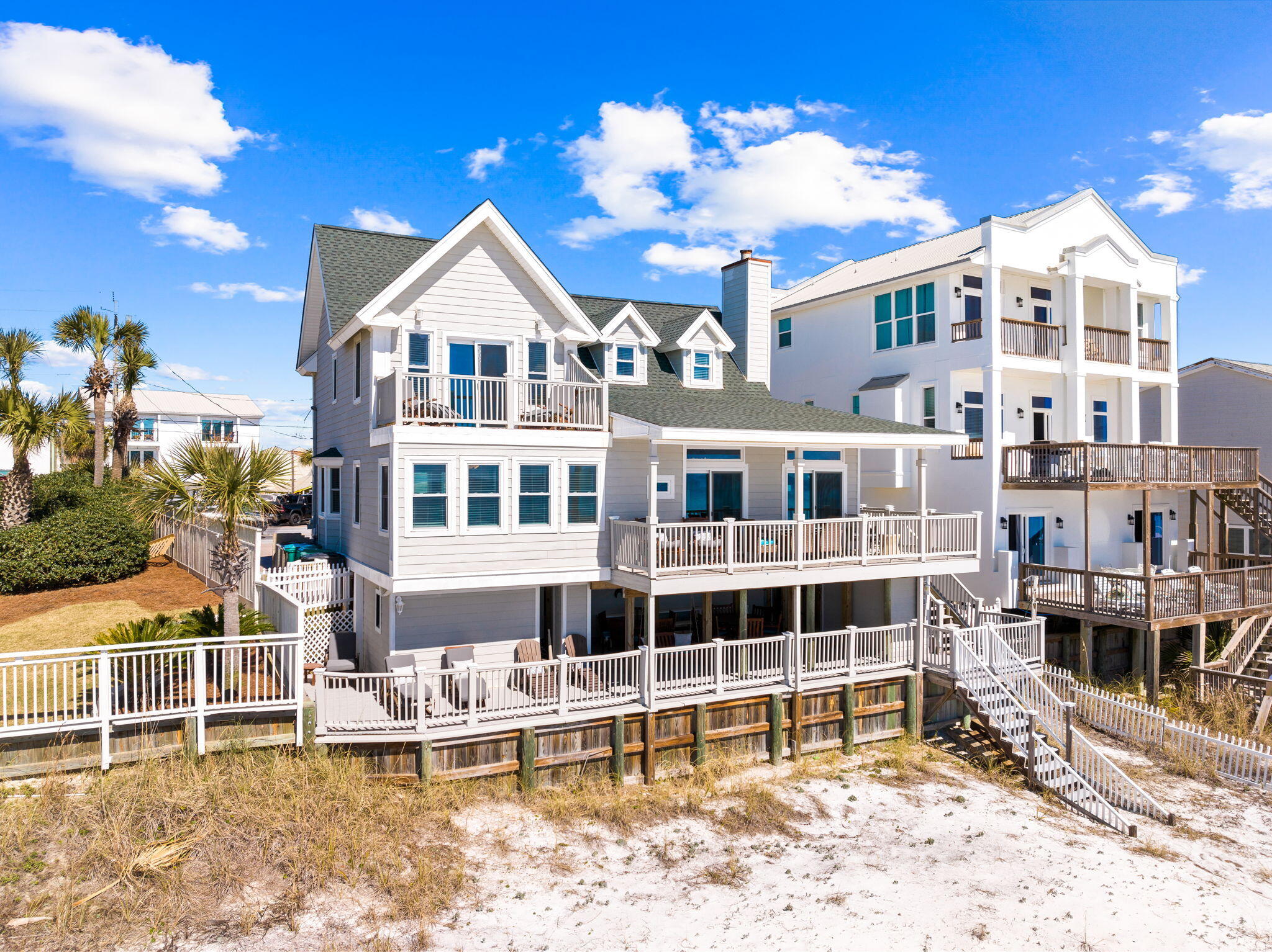 Located on a larger lot just east of Frangista Beach, this updated gulf-front home has plenty of parking and outdoor living space and no HOA. Fifty-two feet of prime beachfront provides uninterrupted views of the shimmering Gulf of Mexico and direct access to the stunning white sand. You'll start to unwind the moment you step inside this light and spacious beach house, which benefits from an open floor plan. The spacious family room has plenty of room for socializing, relaxing and dining. However, you'll probably spend most of your time enjoying gulf breezes as you relax on multiple well-planned decks. The capacious kitchen has quartz counters and everything you need to serve up snacks, drinks and family meals. Start the day together around the breakfast table within sight and sound of