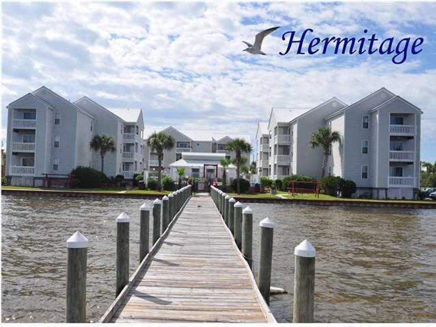 Great bay front condo!! This two bedroom/two bath condo is conveniently located on Okaloosa Island in between Destin and Fort Walton Beach. You can go from the white beaches of the Gulf of Mexico at John Beasley State Park to the Choctawhatchee Bay just by crossing the street. Enjoy fishing from the complex private dock or swimming in the bay front pool. The Hermitage by the Bay is a quiet waterfront community of 42 units. This would be perfect for a boater as you are minutes from Crab Island and Destin Harbor.