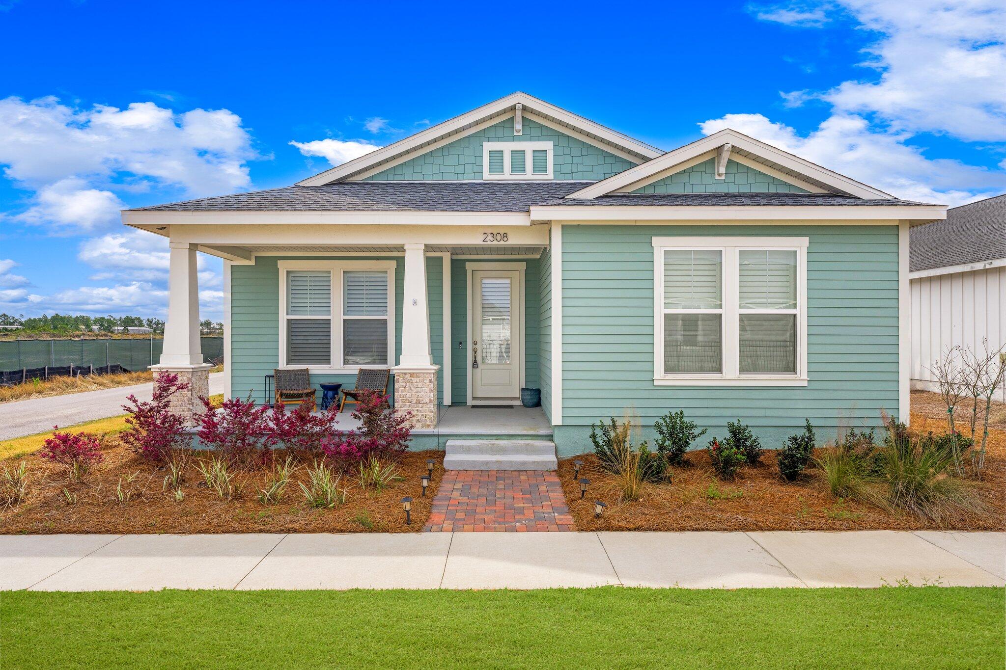 'CURRENTLY UNDER CONTRACT, SELLER WILL CONSIDER BACKUP OFFERS' The Estero floor plan featuring a Boat Builder elevation, is one of the most popular Samuel Taylor home designs! Boasting 2,043 square feet of space, this residence within the vibrant SweetBay community offers a sprawling single-story layout, comprising 4 bedrooms and 2.5 baths. One bedroom is perfect for a home office. The expansive kitchen is adorned with stainless steel appliances, elegant granite countertops, and a tasteful backsplash. Step onto the covered front and back porch to relish in the serenity of SweetBay's surroundings. Furthermore, this home is meticulously appointed with custom-EF San Juan designed inset kitchen cabinets reaching the ceiling, accentuating an island cabinetry with a distinct hue.