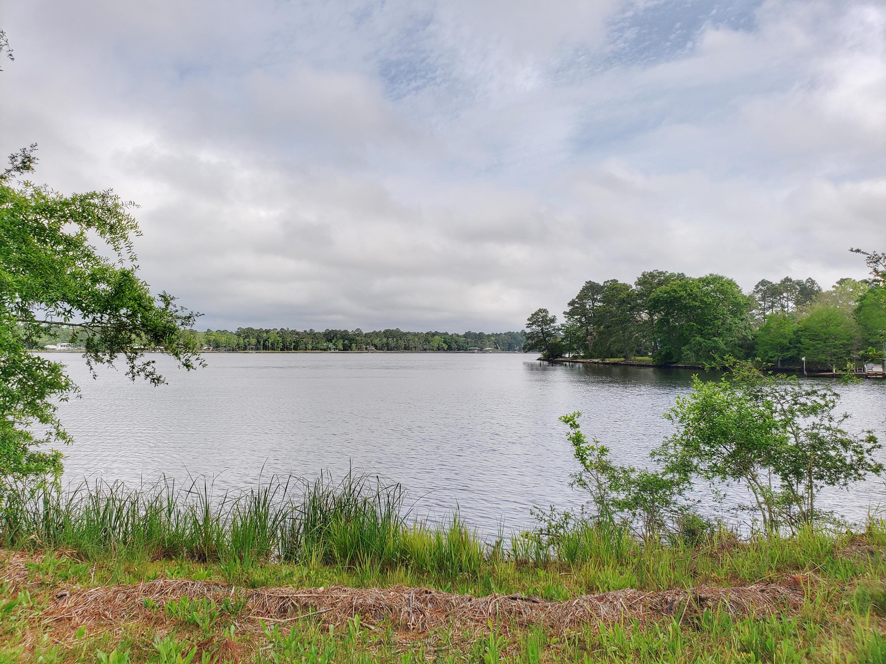 Boaters Paradise! This half acre home site, located in the 12-lot gated community of Lagrange Cove, offers 86 ft of shoreline on Lagrange Bayou, a true deep water bayou. Full service marina is located less than a mile to the north up Lagrange Bayou, for all your boaters needs, complete with marina store. Boat over to The Bay restaurant to enjoy bayfront dining at in South Walton. Restaurants, shops, and Publix grocery store also located less than 3 miles away. Build your custom home and take advantage of the open waterfront views of Lagrange Bayou. Neighborhood boasts central water feature, privacy fence with gate and 12 waterfront lots. Lot 9 faces north so boat dock should be better protected by land from major storms. This property is truly a rare find which you need to see in person.