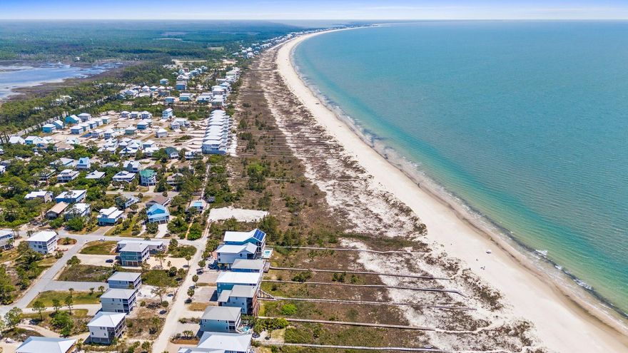 292 Pebble Beach- Cape San Blas Prime Gulf-Front Lot - Builder Opportunity/New Dream Home Opportunity with Proven Rental ROI- NO HOA.For the builder or investor seeking a premier coastal project, this 0.89-acre gulf-front lot in Cape San Blas/Port St. Joe offers 70 feet of direct beachfront and an incredible opportunity to capitalizej on strong rental demand. Current DEP build permits are already in place for 2 separate build plans, allowing for the maximum allowable home size--perfect for constructing a luxury beach home tailored for high-end vacation rentals. Surrounded by similar newly built properties generating upwards of $225,000 in annual rental income, this lot presents a compelling opportunity for a high-return investment. Located in the heart of Florida's Forgotten Coast, the property sits conveniently between Cape San Blas, Indian Pass, and Port St. Joe giving future guests easy access to dining, recreation, and waterfront activities. The site's unique position adjacent to the Surfside Estates dune walkover easement ensures unobstructed, panoramic views of the pristine dunes and the shimmering Gulf of Mexico elevating its value and appeal. Don't miss this rare chance to develop a premier beachfront home in one of the region's most desirable and scenic locations. Whether for resale or luxury vacation rental, this lot delivers the setting, size, and income potential savvy builders are looking for.