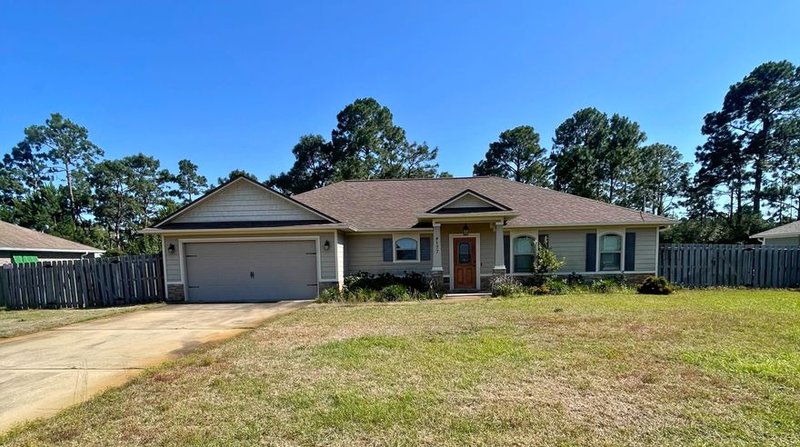 Welcome home to this stunning Craftsman-style property in one of Navarre's most desirable areas! Situated on a spacious almost half-acre lot with no HOA, this home offers privacy, updated landscaping, and a prime location near the beach, restaurants, and Hurlburt Field.  Features include high ceilings, double tray ceilings with crown molding, granite countertops, a built-in water filtration system and a large master walk-in closet. Enjoy a lovely shed, finished garage floor, and gas plumbing availability for easy conversion. The oversized master bath provides a perfect retreat.  Professional photos will be added once the home is vacant--schedule your showing today!