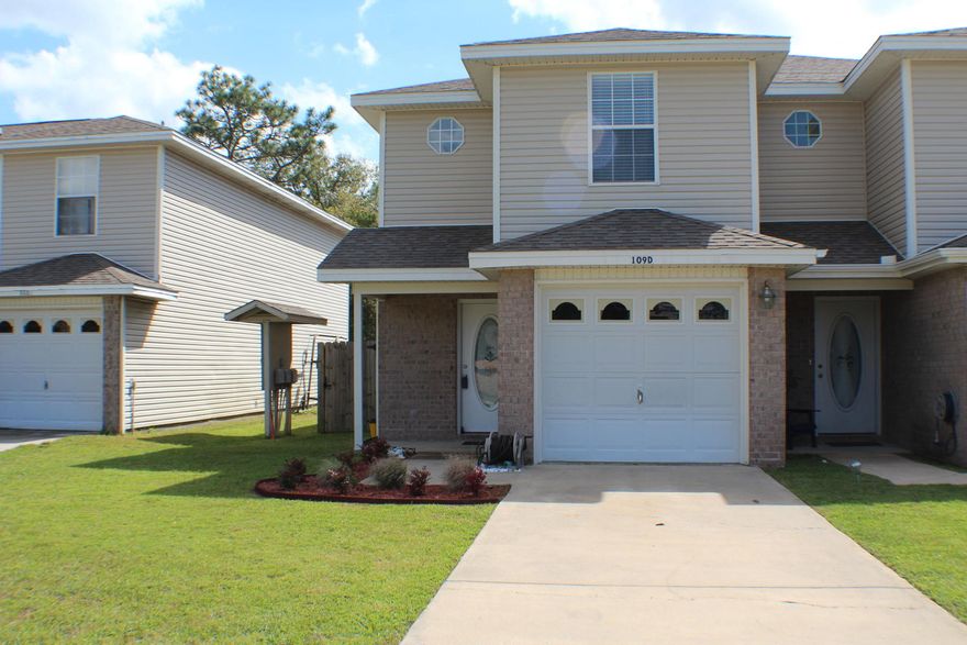 Beautifully updated end unit town home in the heart of Fort Walton Beach. The back porch/deck area is perfect for entertaining guests.