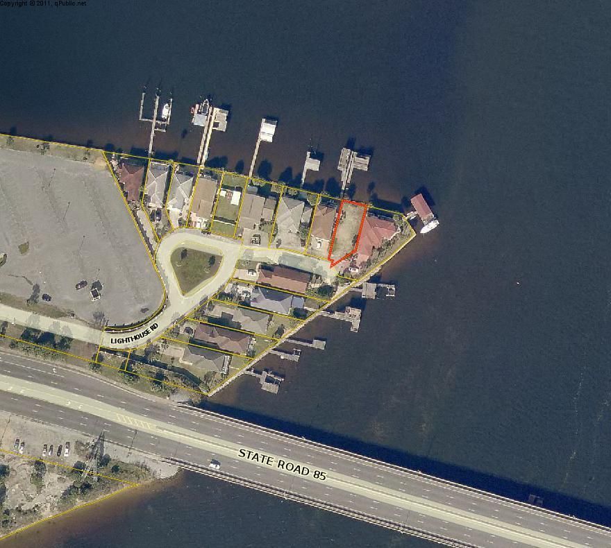 ONE OF A KIND TREASURE! Sensational waterfront lot in Fort Walton Beach situated on Choctawhatchee Bay and Garniers Bayou. Enjoy some of the best views available along the Emerald Coast. Conveys with a deep water dock & boat slip with a fortified seawall.