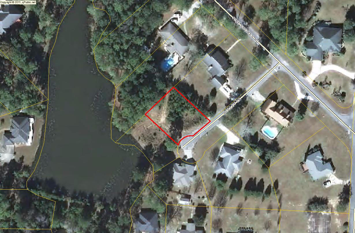 Attractive and affordable home site in Pine Shores S/D. Invest now for the future or build your dream home today! city utilities. Close to town.