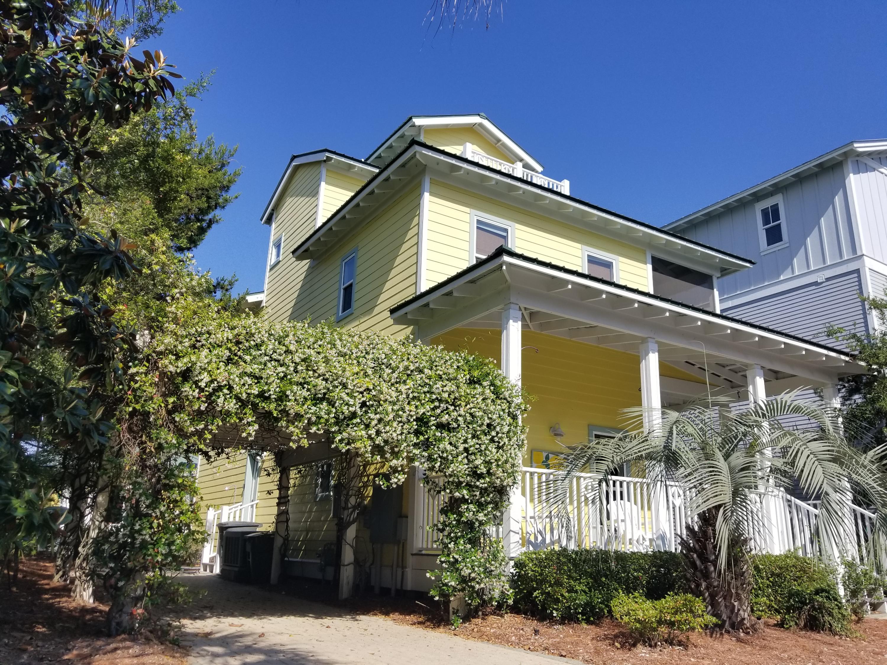 Projected over 70,000.00 Rental Income. There are few homes in Seacrest which offers a large entertaining area outside and this is one of them! Enjoy the Florida breeze from any of the 3 wrap around balconies on this 3 story home. ''Lemon Drop'' Offers a main house with carriage house nestled out back for a total of 4 bedrooms, 4 baths and can accommodate 13. This would make an amazing 2nd home or investment for anyone looking to be apart of the beach lifestyle out on 30-A. The main house features an open floor plan with lots of natural sunlight. Large bedroom on the first floor with patio access. Two master bedrooms on the 2nd floor, each having their own screened in wrap around balcony access. This home also offers covers parking to protect your vehicle from the the hot Florida sun.