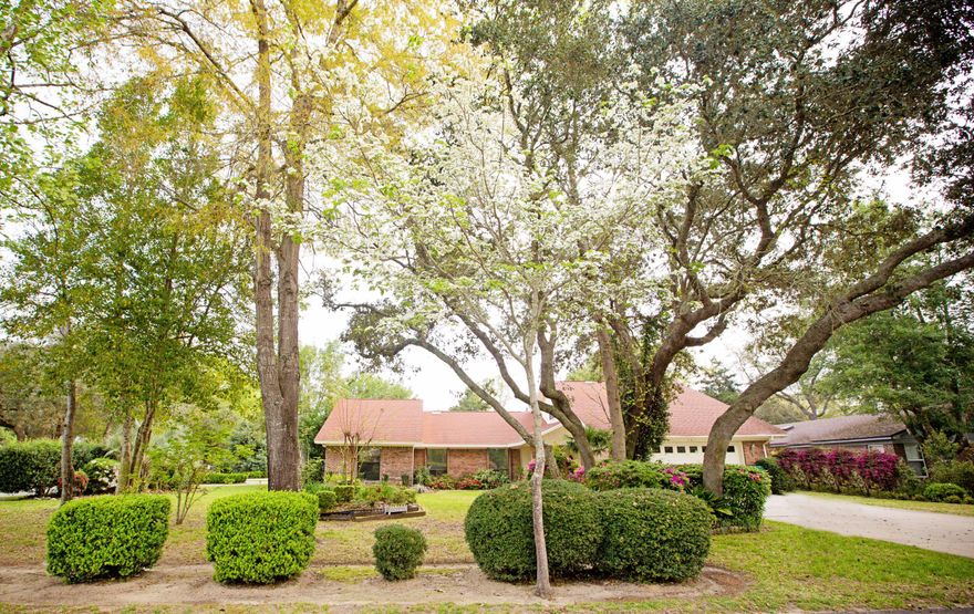 Wonderful spacious 5 bedroom home in the desirable Kenwood neighborhood with 4 full bathrooms! This home is newer than most of Kenwood and has only ever had 1 owner! Situated on a great oversized corner lot with lots of mature oak trees and landscaping. Kitchen has been updated and is a very large open kitchen with a great island. Two living rooms and an upstairs bonus room make this a great home for large families. Lots and lots of storage too. Walk in closets galore and lots of attic storage that is easily accessible. Owners even have semi- finished a room for holiday decorations and crafting. Would make a great craft room if a small heating and cooling unit was added. Owners added a side kitchen entry door with great circular driveway which is very convenient for unloading groceries.