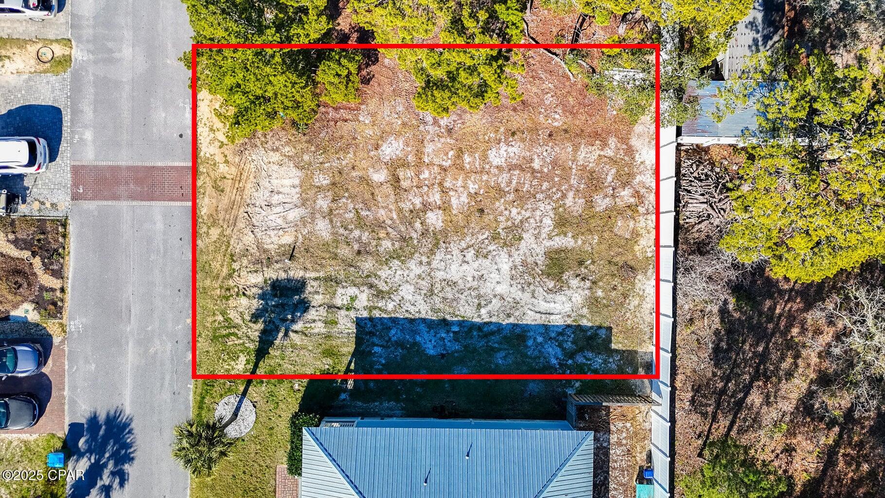 A great opportunity awaits you at Paradise Grove! Paradise Grove is a gated community with a great community pool to enjoy the hot Summer days. The community also offers a green space for a relaxing picnic or place to walk your family pet. Just four blocks to the beach!. This lot is ready for your family to start building your dream home!
