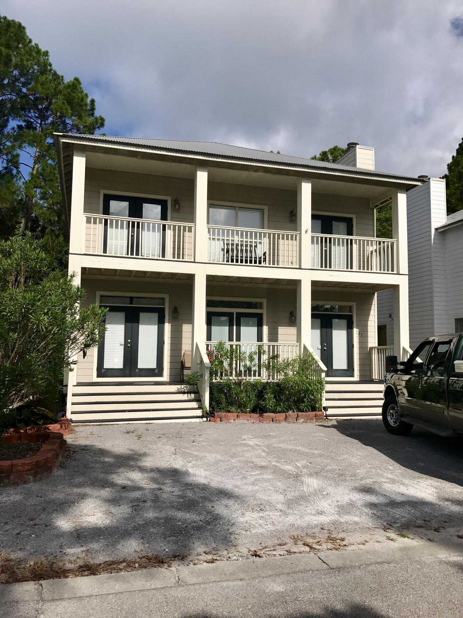 Adorable beach cottage down the street from Inn at Blue Mtn on 30A. Great Rental potential with conservative projection at $33,000. Open area with kitchen, dining area and living room for entertaining and large front porch. Large master bedroom upstairs with a door to the balcony and private bath. All bedrooms have a access to balconies! Large multi-level deck which overlooking wooded area. Public Beach Access next to Inn at Blue Mountain. HOA is optional, but this owner is not a member, however the owner can pay $900/year to access Village of Blue Mountain Beach pool and fitness center.