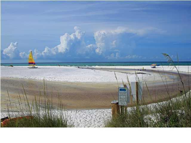 Tucked away off 30A ,this Quiet Gulf Front Condo has been Renovated Beautifully.Full 360 degree Unobstructed Views of the Gulf. Unusual to have Slate Floors and these are Lovely! This Condo has a attic space that could be converted into another Bedroom or Media Room.Only 2 miles to Seaside.Right next to Eastern Lake where Kayaking is a must. This one is a Rental Income Machine!