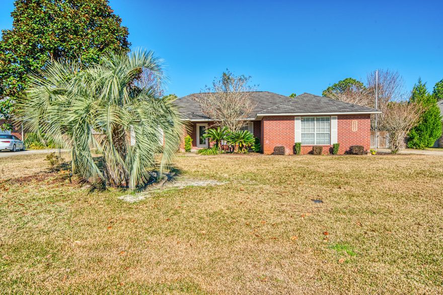 Beautiful and spacious! This Holley by the Sea screened-in POOL home is all brick, features 3 bedrooms PLUS a bonus/office space and is situated on a half acre, fully fenced lot. And, best of all - no carpet! Brand new LVP flooring in bedrooms and tile elsewhere. Some fresh paint, a new backsplash, and on-demand water heater for the beautifully tiled master shower are some of the updates making this home turnkey and ready for new owners now! New roof to be placed prior to closing!