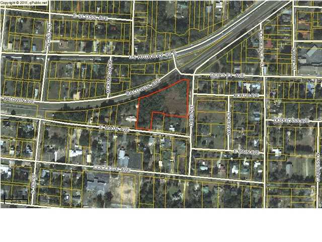 Possible home site or great location for office building on this mostly cleared 2.58 acre city lot. Current zoning is R-2 multi family residential. Also professional office business allowed. Survey available. This parcel can also be separated (see MLS #792018 & 792019)