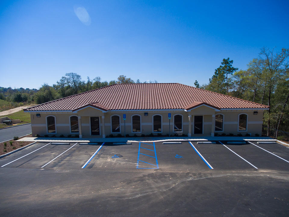 BRAND NEW Medical/Office space available for sale. This beautifully designed commercial space in the heart of Crestview's Medical Plaza area consists of two identical halves. Unit A, which is finished out and occupied by a Physician (See all attached photos). Unit B is for sale as a vacant shell (See Photos). Unit B possesses 2565 Sq. Ft and 9 Ft ceilings, same as Unit A. Unit B has the sewer line, water line, electrical chase and DATA chase already installed in the unit, making this readily available for build out. The land surrounding the structure will be co-owned by the owners of Unit A and Unit B. All of the existing improvements such as land mitigation, parking lot completion and landscaping all convey with the purchase of Unit B.