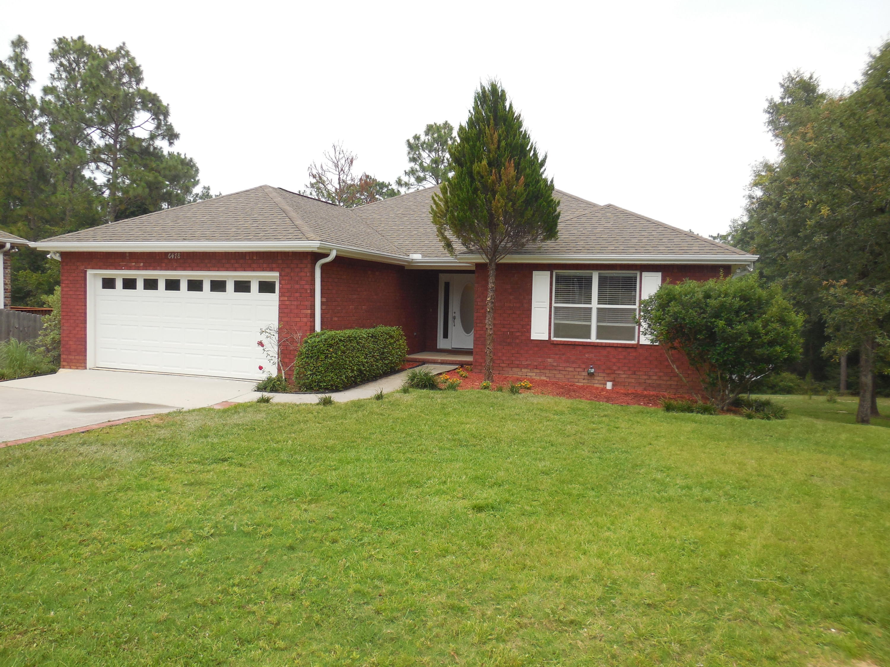WOW, Your Haven Has Been Found! This Beautiful 3 bedroom 2 bath home sits on a cul-de-sac on almost a full acre! The foyer opens directly into the gourmet kitchen with a huge island/B-fast bar, living room and dining area, completely tiled and featuring a trey ceiling over the living room and open deck outside. The master suite features a trey ceiling, a 9x9 walk-in closet, a shower only bath and a private deck. The 2nd bedroom has a double closet. The 3rd has a walk-in closet. There is an office off the kitchen for your convenience. For further entertainment, enjoy the downstairs family room and walk out onto the covered deck for great BBQs! The grounds have been artfully landscaped with a stair/pathway to the backyard. An indoor laundry, 2-car garage and NO HOA rounds it out!