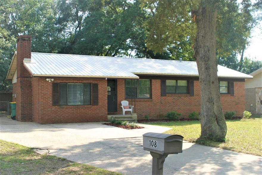 Recently remodeled,new kitchen cabinets,countertops,subway backsplash,stainless steel appliances, Hickory wood laminate w/tile in baths,crown molding,51/2'' base molding wainscoat/chair rail, craftsman door trim, barn sliding door to laundry room, door knobs, childproof outlets, fresh paint, stained beam in Family, can lights, new light fixtures and the list goes on. When you enter the home the gas firelace with wooden mantel is on left, perfect for the Christmas stockings. Ahead is the kitchen with window over sink convenient for mom to watch the little ones. There are three spacoious bedrooms all with Hickory laminate flooring, 2 inch blinds, hall bath and master have been updated. There is even a metal roof.1/4+ac lot, room for a pool or outdoor kitchen. Make this one a must see.