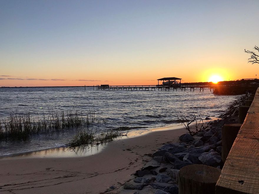 Come build your dream home on this bay front property with spectacular views. This property sits in a wonderful & established neighborhood. Peaceful and serene setting in Lake Pippin with mature live oaks on more than a half acre with 100 feet of waterfront & seawall, not to mention the lot is high & dry! Come experience for yourself because nothing is better than stepping your feet onto your own private beach.