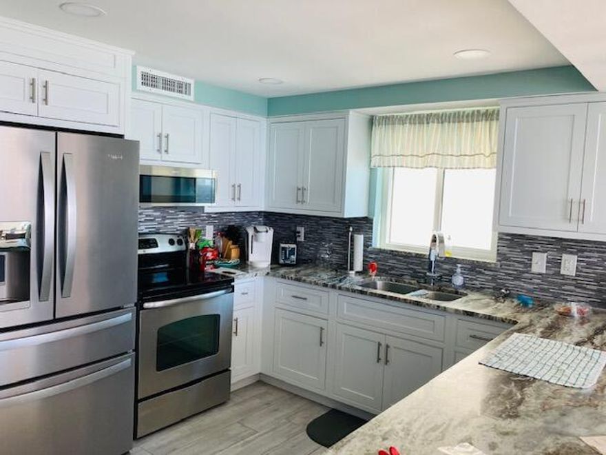 GREAT LOCATION IN SHORELINE TOWERS. DIRECT BEACH FRONT 3 BR 2 BATH CONDO WITH OPEN FLOOR PLAN. TILE PLANK FLOOR THROUGHOUT. NEW KITCHEN CABINETS, GRANITE COUNTERS AND BACK SPLASH. ALL STAINLESS STEEL APPLIANCES. BATHROOMS TOTALLY UPGRADED.REMODELED AND UPDATED THROUGHOUT..