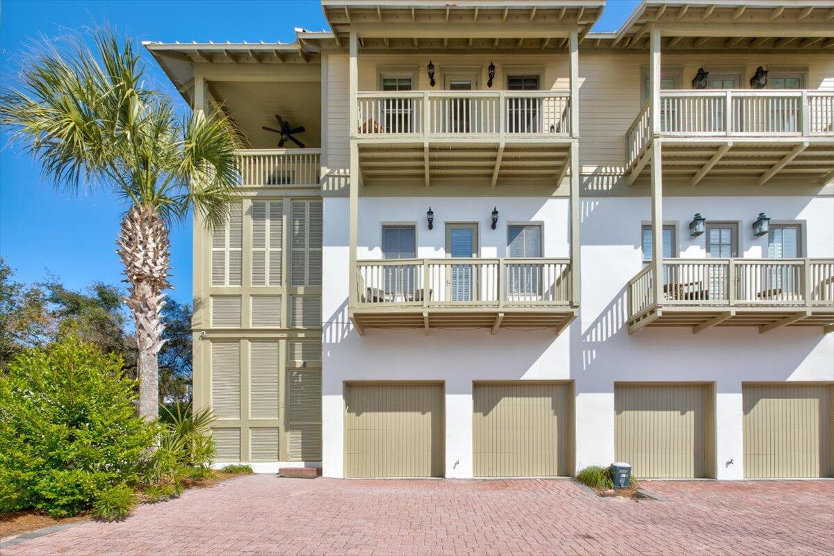 Nestled in one of the most coveted locations along 30-A, this gated, fully furnished beach house is ready for you to come in and enjoy! This property would make an excellent second home or vacation rental. Offering 3 spacious bedrooms and 4 full bathrooms with over 2000 sqft of living space! What you will enjoy most are the 2 enclosed patios and 4 covered balconies for lounging and soaking up the beautiful views of Seacrest Beach. The exterior and all 6 patios have been newly painted and are ready to enjoy! The interior has a fresh coastal feel that's inviting and filled with light with several cozy areas for everyone in your family to relax. A rare two car garage for storage with a door leading directly into the home for added convenience.