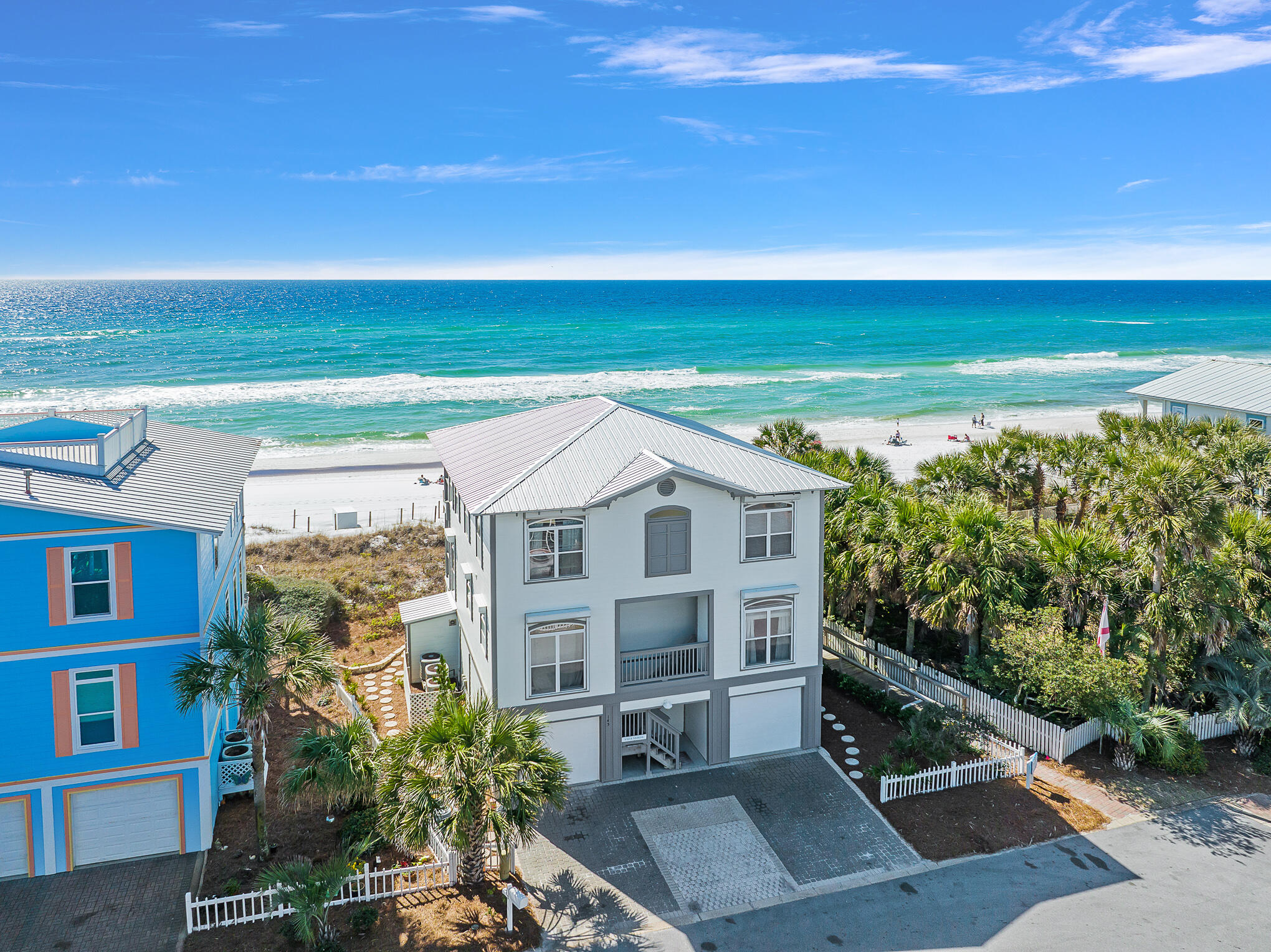 Sunrise Beach is a sought after, highly desired gated community on 30A that is in a premier location! This gulf-front home is perfectly positioned on the sand, east of the Gulf Place Town Center and walkable to local restaurants, boutique shopping and all that 30A has to offer! This gorgeous home is designed with a master suite overlooking the pristine Gulf of Mexico to include a private balcony and a sitting area perfect for those quiet mornings watching the waves roll in. The open floor plan of the great room features a spacious living area, dining room flooding with natural light and a kitchen that is fit for entertaining. This home is ready for rentals with new furnishings, exterior paint and plenty of storage. You don't want to miss seeing  this GULF FRONT gem!