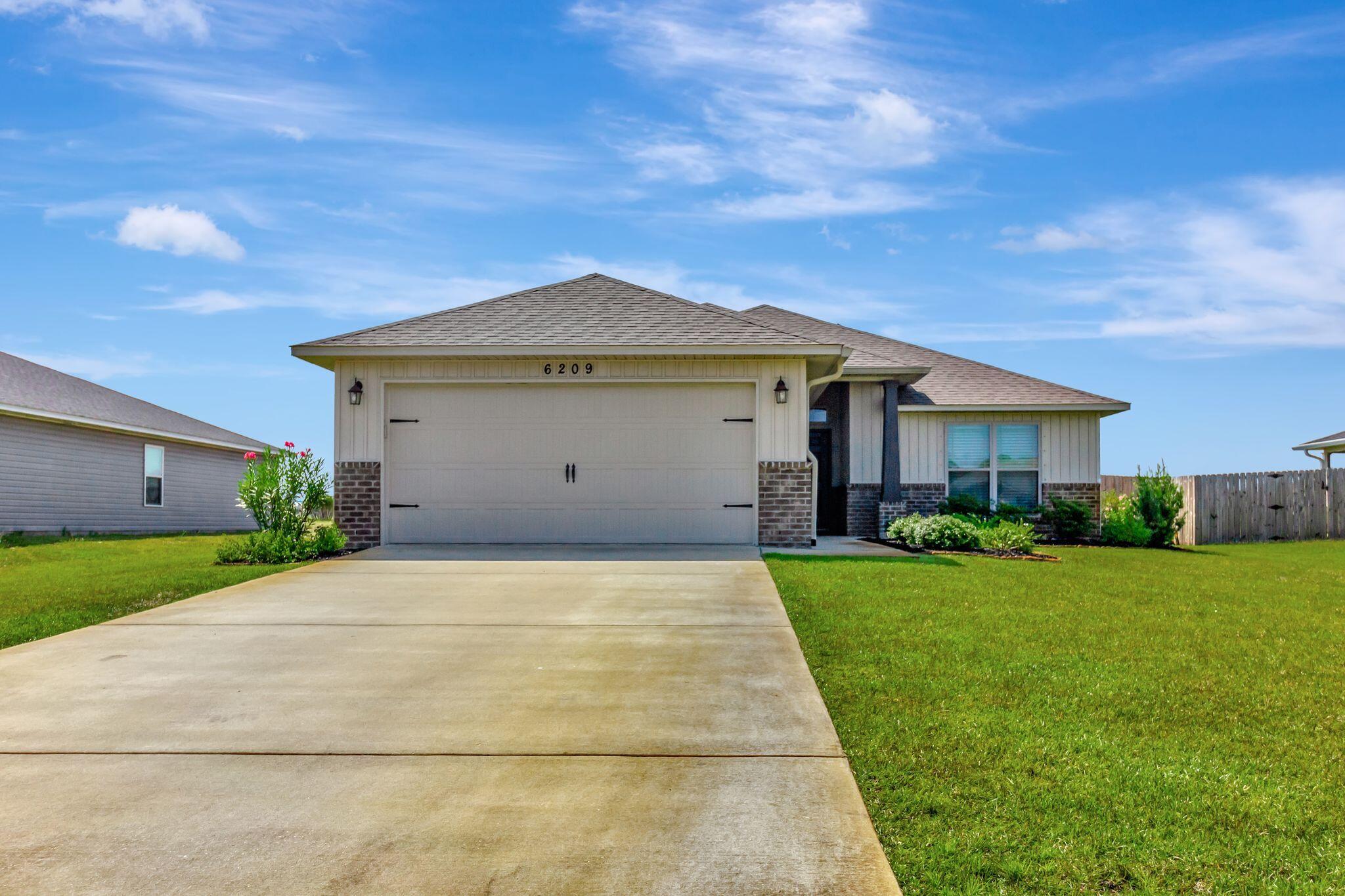 Welcome to Heather's Place, a master-planned community from Henry Homes. This charming cottage-style ranch home community boasts beautifully sodded yards, sidewalks, and underground utilities. Enjoy the convenience of public water and sewer, with easy access to shopping, schools, and just 8.5 miles from Navarre Beach!As you step inside, you'll be greeted by an inviting open floorplan that seamlessly blends the living, dining, and kitchen areas. The heart of the home boasts stunning granite countertops in both the kitchen and bathrooms, complemented by sleek undermount sinks that elevate the overall aesthetic.The kitchen features top-of-the-line stainless steel appliances, granite countertops and a breakfast bar separating living area and kitchen; perfect for either a quiet meal or entertaining guests! 

Upgraded LVP flooring flows through the common and wet areas, adding a touch of sophistication, while plush carpet in the bedrooms creates a warm and inviting retreat at the end of the day.

The primary suite is a true sanctuary. It showcases an ensuite bath with soaking tub, separate tile and glass shower and large double vanity that adds a spa-like feel to your daily routine. 

Step outside to the covered back porch, where you can unwind and enjoy your favorite outdoor moments in your privacy fenced back yard. Sip your morning coffee or host friends for a barbecue. You will have plenty of space for everyone!

This home is not just a place to live; it's a lifestyle waiting to be embraced. Don't miss the chance to make it yours!

No smoking or vaping. Dogs may be allowed with some breed and size restrictions and a $400 non-refundable pet fee.

FEES: $50 per adult 18+ application fee, Landlord Liability Policy (if proof of Renter's coverage is not provided) $15 mo, Pest Assurance pest control policy $20 mo.