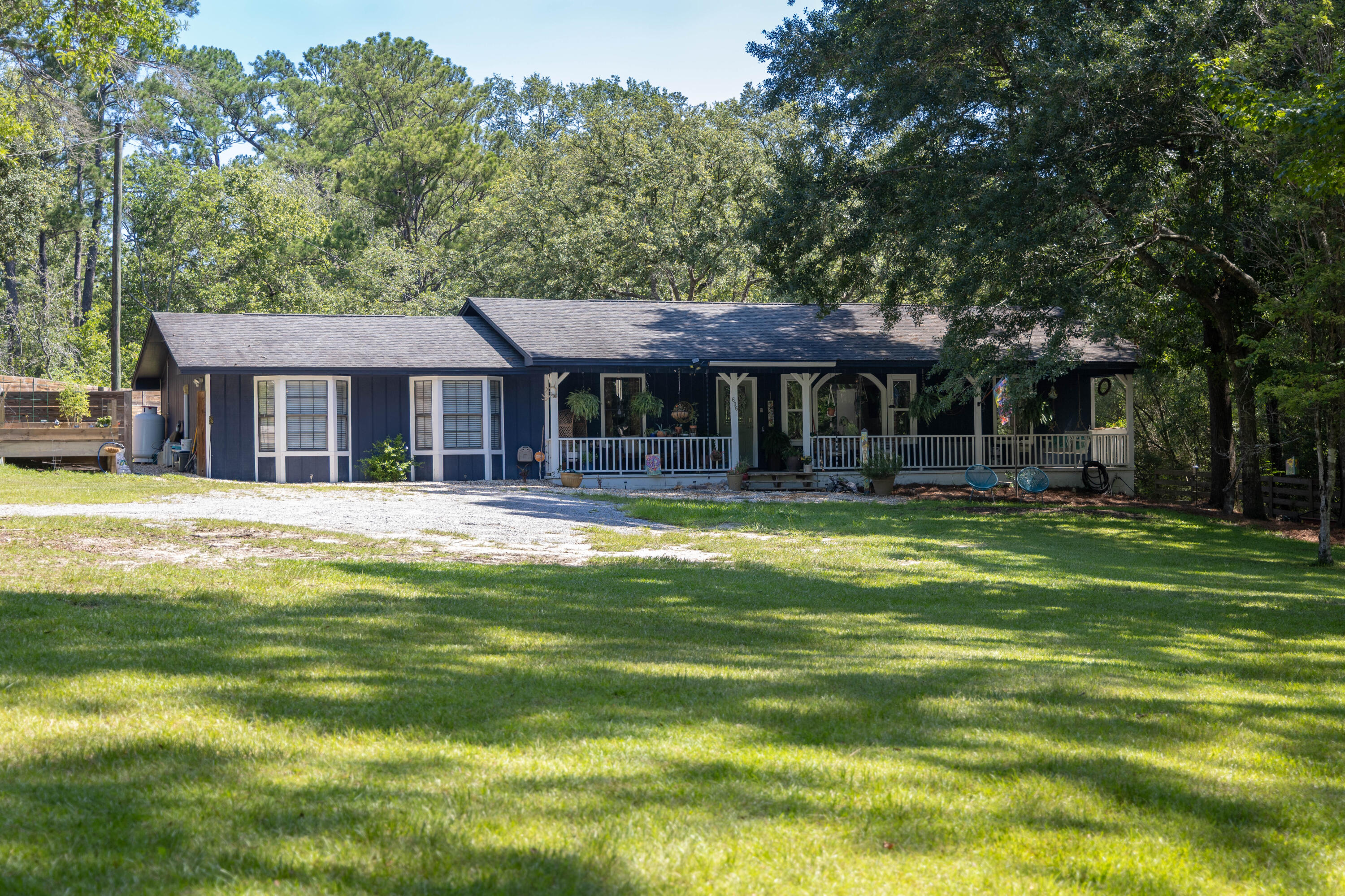 Waterfront Paradise - Welcome Home to 696 Phillips Drive! Tucked away in the peaceful Landings community, this beautifully updated FL cottage offers the perfect blend of tranquility, charm, & modern comfort. Set on over an acre of land w/100+ ft of private waterfront, this 3-bedrm, 2-bath retreat features 1,768 sqft of single-level living w/an open, split floor plan, cathedral ceilings, abundant natural light, great closet storage, & updated roof '16, AC '18, & water heater '23. Inside you'll find fresh paint, updated finishes, & an entertainer's dream kitchen w/white cabinetry, granite countertops, stainless steel appliances including a gas range, elegant subway tile backsplash, gold accents, & plenty of storage space. The expansive master suite is a true retreat, complete w/a custom walk-in closet, private bath, & a bonus space ideal for a dressing area, reading nook, or home office. The additional bedrooms are spacious & private, perfect for guests or a growing family.
Enjoy your morning coffee or evening cocktail in the screened-in Florida room, surrounded by the sights & sounds of nature. From the front & back porches, you'll love the peaceful wooded views & frequent visits from local wildlife, a true bird-watcher's paradise.
Love the water? Launch your kayak or take out your boat from your private dock & explore the scenic river channel w/direct access to the bay. There's also a large, detached workshop for hobbies, extra storage, or potential guest accommodations already set up with electricity. Located on a quiet dead-end street w/ample parking, this home is perfect as a full-time residence, weekend escape, or vacation rental. Move-in ready & priced under $500K, this is your rare chance to enjoy Florida waterfront living without compromise.
Schedule your private tour today, this one won't last!