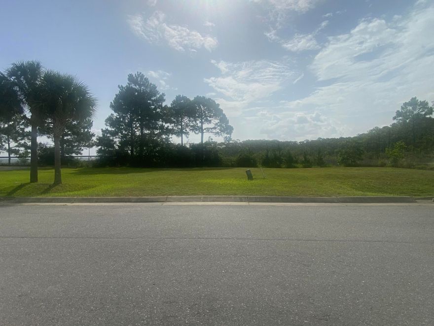 Own your own little piece of bay front paradise with unobstructive views nestled in the gated community of Clipper Bay.  Being able to have a dock for your boat and no one able to build behind or to the south side, this lot offers privacy and stunning views of the bay and marshland for your dream home.  Permit is in place for 240' boardwalk & 60' access pier for your boat.  Permit would need to be reauthorized.  This lot is ready to be built on with water connection, sewer tap and power.