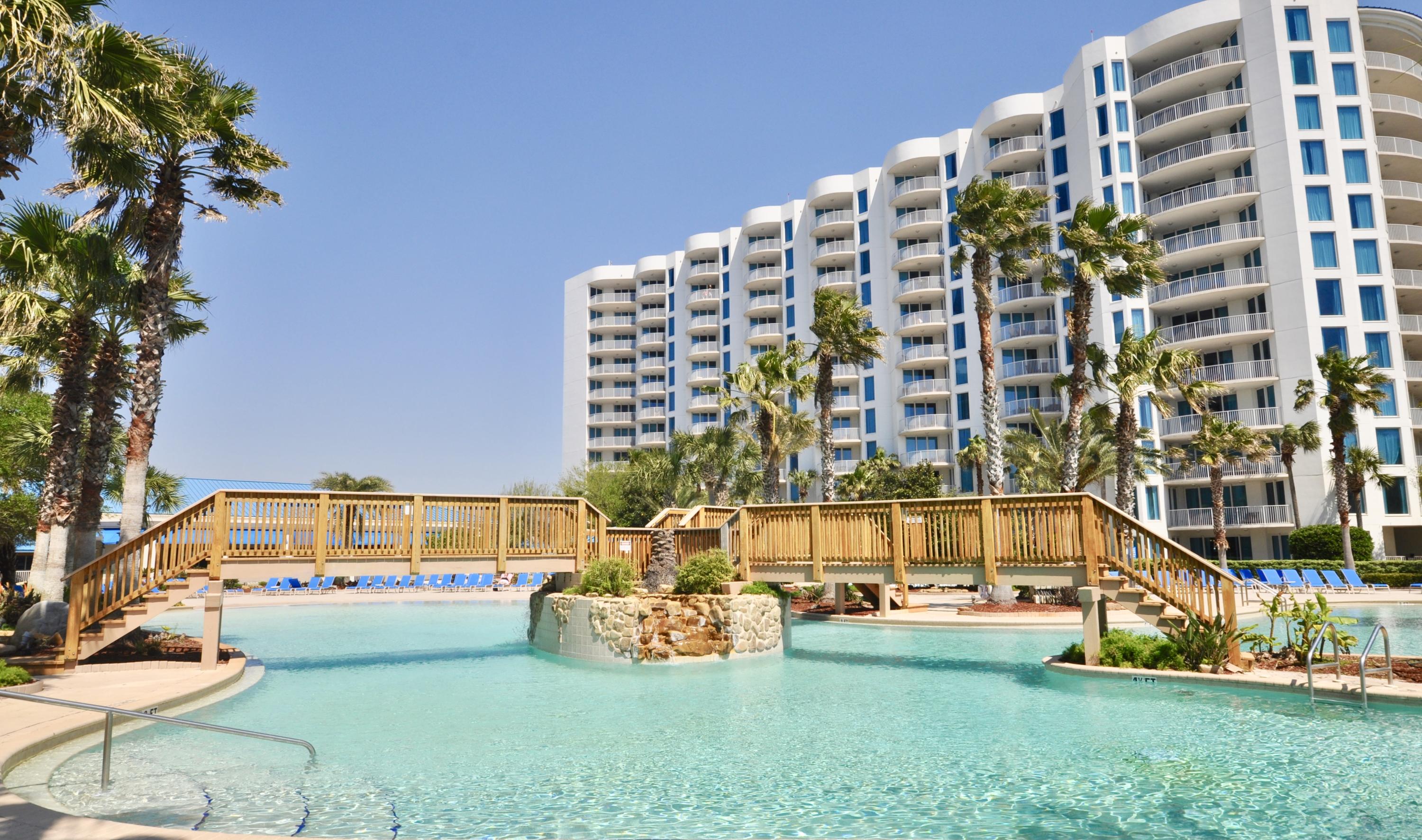 Fantastic views of the gulf. Upgrades throughout, including Armstrong lighting, Lovelace Interiors furniture, crown molding, a new backsplash, upgraded washer and dryer and this condo is still under a home warranty. The amenities include a work out facility, lagoon style pool, property has covered parking, security, tennis courts, a basketball court, playground and shuttle service to the beach Emerald Grande and Destin Commons. The onsite pizza pub can be delivered to your room and they even have a full service Spa on the grounds. This is such a well laid out floor plan. Whether you are planning to rent or live here, this is one you won't want to miss, it has been a primary residence and shows so well. This is in the west building with views of the gulf.