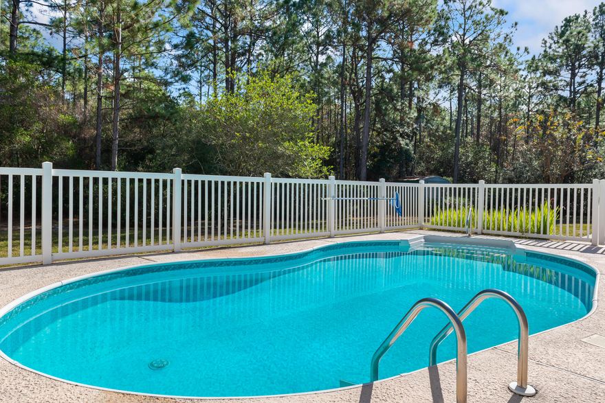 Property finally out of probate and sellers say sell!!!This 5-bedroom 3 baths.  Bathrooms come equipped with  dual seat showers. Home is host to  eat in kitchen,  formal dining room, great room, split bedroom plan, plus a Florida room with an additional bedroom suite set up ideally for guests or that live in in-law.  In ground pool vinyl liner replaced in 2020, Water heater 2014, 4-ton, 14 SEER Rheem heat pump with 10KW electric auxiliary heat 2017 and roof replace in July of 2021.  Home is equipped for a whole house generator plug, separate yard building with electricity.  Private cal de sac setting with greenbelt areas to the south, east and north add to the privacy of the lot.  No fences needed.