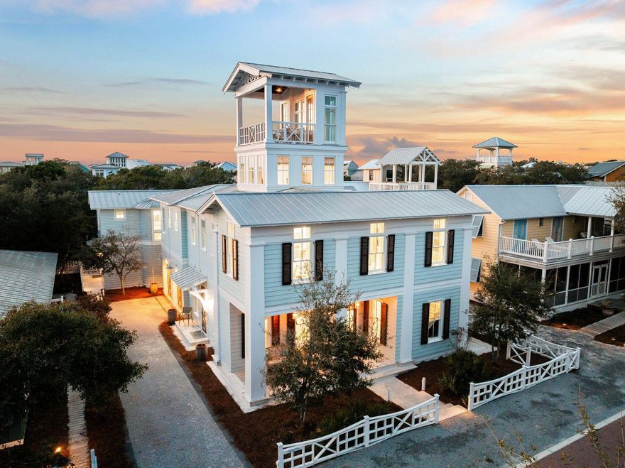 Welcome to the most highly valued location and new home in Seaside, Florida north of 30a with masterpiece views of the Gulf. Constructed in 2019 and in 2021, this home represents the direction of the new emerging town. Three lots north of 30a on Tupelo Street, this lot is 60 by 102 feet being among the larger of the more traditional Seaside home sites. Of the few homes in Seaside with a pool this home also has an integrated separately plumbed hot tub for relaxing after an active lifestyle day. The first floor features a large guest en suite along with the living space, a bunk room and an additional bath. Entertainment easily extends to the courtyard pool. The elevator or stairs take you to the primary living level with a true master chef kitchen. With two sinks and two dishwashers and an entertainer's island, the best of all gatherings can be held here with ease. Dining and living in an open area with extraordinary trim detail and vaulted beamed ceilings are things not found in Seaside in most all homes.  The laundry, office space and primary en suite bedroom and an additional en suite guest bedroom complete the space with a 1/2 bath serving the living area.

Transitioning to the third level quiet tower space for morning news or coffee or relaxing with a good book begins to unveil the substantial views of the gulf. However, there remains the upper level walk out tower deck. 

Captivating views that are among the best that can be achieved await you for another place to have a great cup of coffee or an evening sunset show every day of the year. As if enough, the home also has an 800 square foot Carriage house. The carriage house is 2 bedrooms and 2 and 1/2 baths fully functional home with a great kitchen and washer and dryer. 

There are very few homes in Seaside that have been able to achieve an oversized carriage house in addition to a main home, and going forward, such cottages will be more difficult to construct in Seaside. This is your chance to acquire a legacy home for your family and enjoy it for years to come.   This is among the very few residential homes in Seaside, Florida.