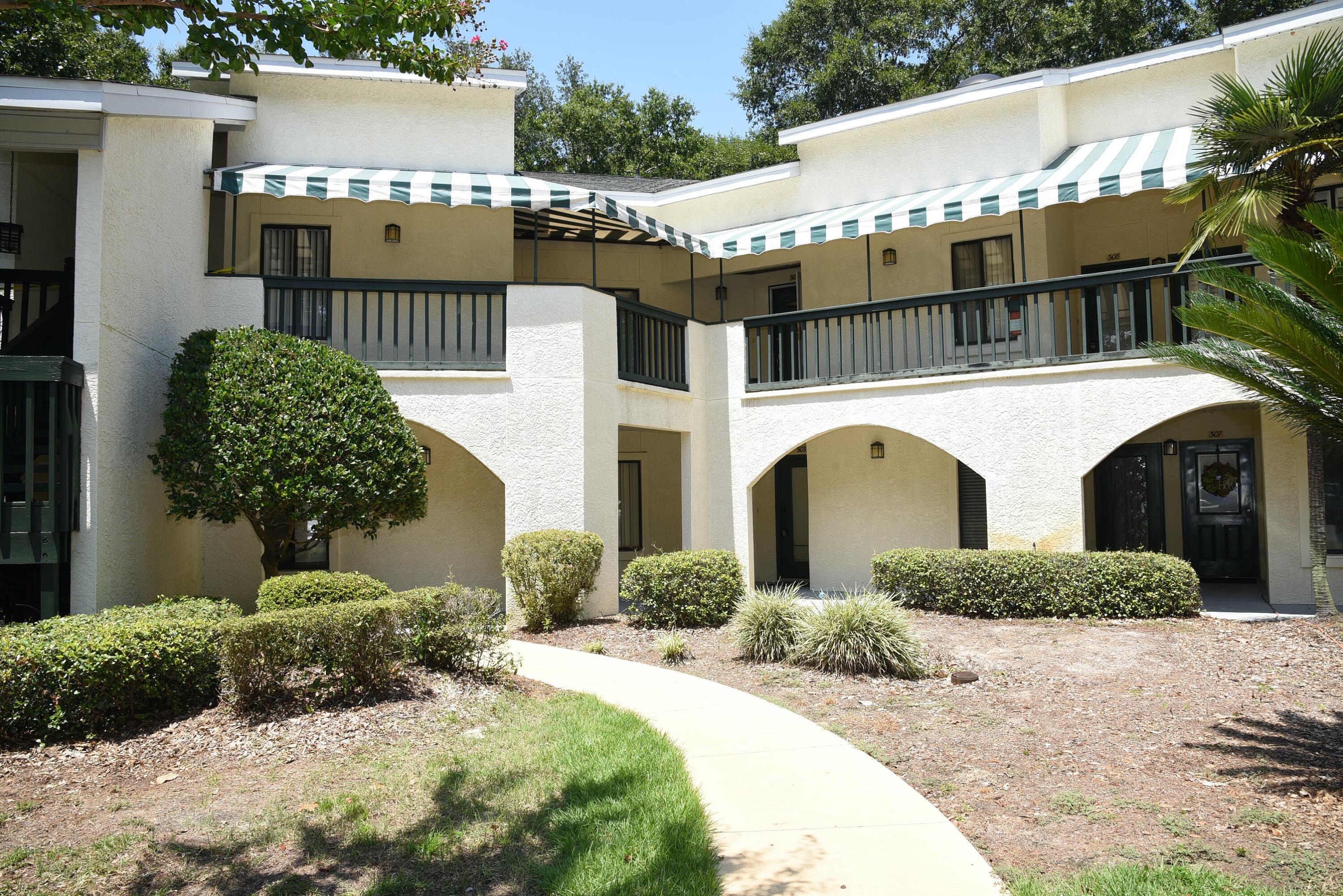 Great lake view condo! Furnished with utilities included.Two sets of sliding glass doors, one in the great room and the other in the dining area, open onto a covered patio (6 X 25) so one can enjoy the beautiful view overlooking the lake. The master bedroom also has a sliding glass door and a private covered patio (6 X 12) to enjoy the beautiful trees and lake. Wonderful breakfast bar is an added touch. Kitchen appliances are black; GE dishwasher, refrigerator with ice maker, microwave and electric smooth surface stove/oven, washer & dryer are located in the closet of the kitchen This very well maintained unit is a pleasure to enjoy. NO SMOKING, NO PETS. Any person 18 years old or older must apply separately. Tenants required to carry renter's liability insurance