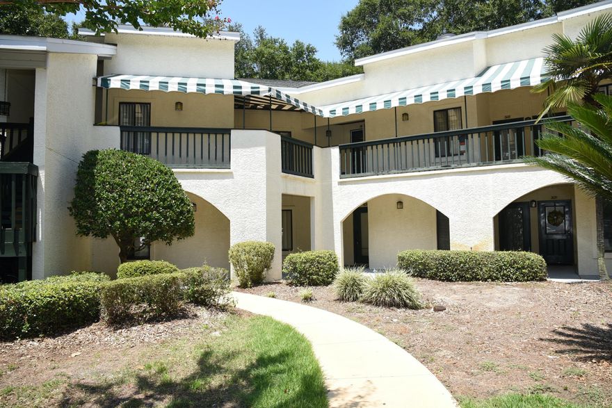 Great lake view condo! Furnished with utilities included.Two sets of sliding glass doors, one in the great room and the other in the dining area, open onto a covered patio (6 X 25) so one can enjoy the beautiful view overlooking the lake. The master bedroom also has a sliding glass door and a private covered patio (6 X 12) to enjoy the beautiful trees and lake. Wonderful breakfast bar is an added touch. Kitchen appliances are black; GE dishwasher, refrigerator with ice maker, microwave and electric smooth surface stove/oven, washer & dryer are located in the closet of the kitchen This very well maintained unit is a pleasure to enjoy. NO SMOKING, NO PETS. Any person 18 years old or older must apply separately. Tenants required to carry renter's liability insurance