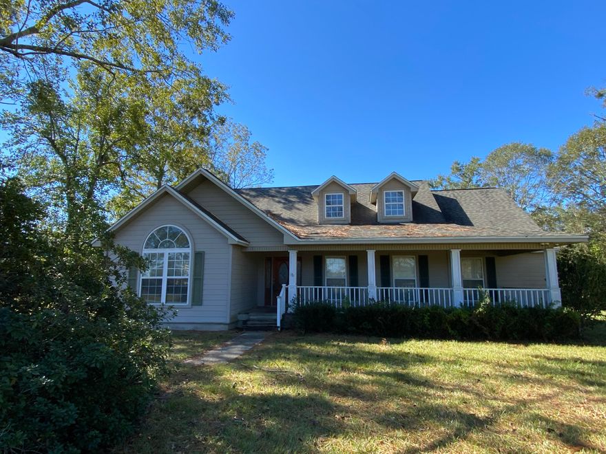 Short Sale; TRUSTEE SALE - MUST SELL! Originally built in 1938, but completely remodeled in 1990, this 3 bedroom 2 bath craftsman style home has an appealing look and feel. Home has dormers, large covered front porch, hardi siding and is on 1 acre. Inside, 3 bedrooms and 2 baths. One bedroom has a loft area that is uniqued used as a library with shelving. Home has well water, hard wood floors and open floor plan! All purchase offers must include a Buyer's Premium of $4,000.00 in addition to the purchase price. Call today!