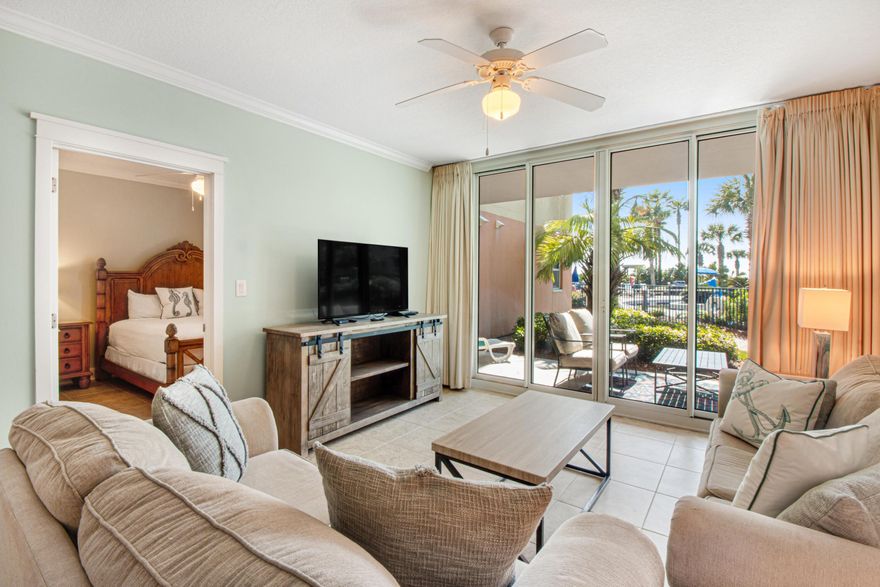 The pinnacle of Gulf front living, this stunning 2 bedroom, 2 bath condo in A building at Waterscape is truly deserving of the term masterpiece. Imagine one of the area's most luxurious condominium complexes with every amenity desired including 490 feet of pristine beach front. This first floor location is very convenient as you can  walk straight out to all of the amenities without having to wait or take an elevator. The condominium's kitchen is well appointed with granite countertops, stainless steel appliances, tiled floors throughout the entire condo, and furnishings that reflect a coastal feel that we all love here at the beach! The remarkable courtyard features 3 pools, 2 hot tubs, waterfall and a famed Lazy River that you have to see to believe! There is also a Children's play area