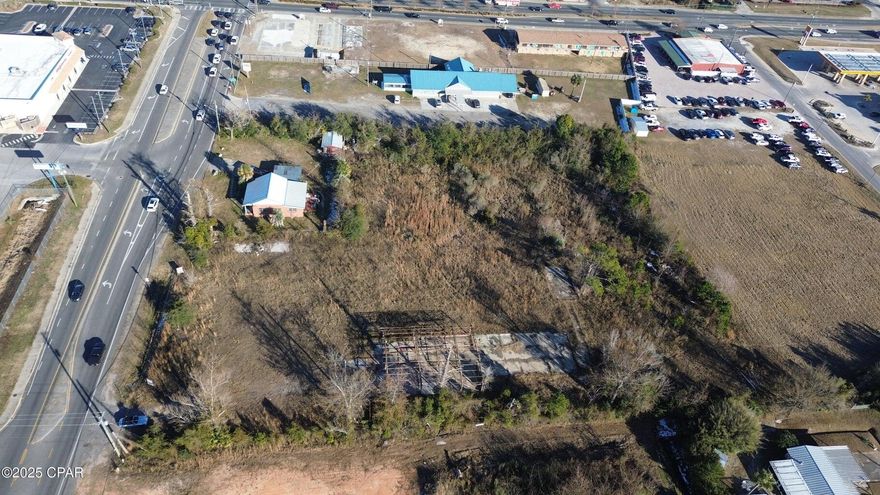 Prime Zoned Commercial Property located at the highly trafficked corner of Highway 22 and Highway 98, offering excellent visibility and accessibility. With 2.68 acres of land in a thriving area surrounded by numerous businesses, this location is perfect for a variety of commercial ventures. The high traffic count ensures great exposure and the potential for significant foot and vehicle traffic. Whether you're looking to build a retail center, office complex, or any other commercial development, this is a fantastic opportunity in a growing area with endless possibilities. Don't miss out on this prime piece of real estate!