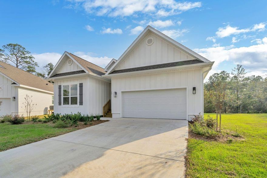 Welcome home to this new, move-in ready home centrally located between schools and Scenic Highway 30A in The Preserve at Paradise Cove. This five-bed, three-bath, single-level home has thoughtful fixtures and finishes such as nine-ft. ceilings, LVP flooring throughout, stainless steel appliances and gleaming quartz countertops as well as designer lighting and smart home technology packages. Upgrades to this home include frameless glass shower door in master bath, whole home gutter system, two-inch blinds, and an upgraded HEPA HVAC system has been installed. This home has a wide, expansive backyard complete with irrigation in place that backs to green space.