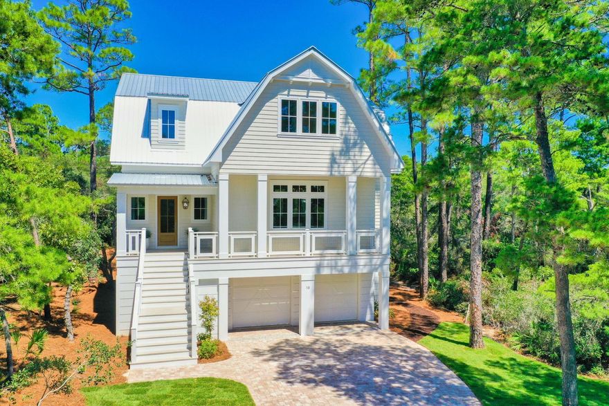 Nestled in the trees, this stately new build on a quiet dead-end street has four bedrooms, five and a half bathrooms, a two-car garage, an additional bunk room and is move-in-ready. The heated and chilled pool will be installed soon. When you enter the main level, there is a half bathroom off the entry. The living room, dining area and kitchen are all open and ideal for family time or entertaining. The main level has 12-foot ceilings, hardwood floors and the master bedroom suite. The master has an ample walk-in closet and a tiled bathroom with a separate tub and shower, as well as dual vanities with custom cabinets. The house has space in the interior for an elevator, which could be added in the future if needed. There is a hidden laundry room off the kitchen, as well as a huge walk-in pantry with sliding barn door. You will find Quartz countertops throughout the home, including the large kitchen island. The furniture in the house was provided by a local designer and can be purchased separately. The back porch is 15 feet wide and 44 feet long and is an ideal space to grill or enjoy a cocktail in the evening. On the top level, you will find another living area, three more bedrooms with ensuite bathrooms, a bunk room with built-in bunks and bathroom, 10-foot ceilings, and a utility room that could be another bedroom, office, hobby room, laundry room or used for storage. The back bedroom on the top level has a private balcony overlooking the greenspace and pond behind the home. The bottom level has a two-car garage with plenty of storage and custom shelving. In the foyer on the ground level, there is also a half bathroom and storage cubbies. The rear paver patio will be a great spot to hangout once the pool is installed in the fall of 2019. There is an outdoor shower and plenty of storage space under the house. The home has the ability to expand underneath as well if needed. Walton County is building the new Dune Allen Regional Beach Access just over a half-mile down the street from the house with parking, bathrooms and lifeguards on Scenic 30A making beach access a breeze. Beach Highlands Neighborhood Beach Access is also available straight down South Bishop Road. There are no HOA dues for this home or neighborhood. All square footage and room dimensions are approximate and should be verified by the buyer.